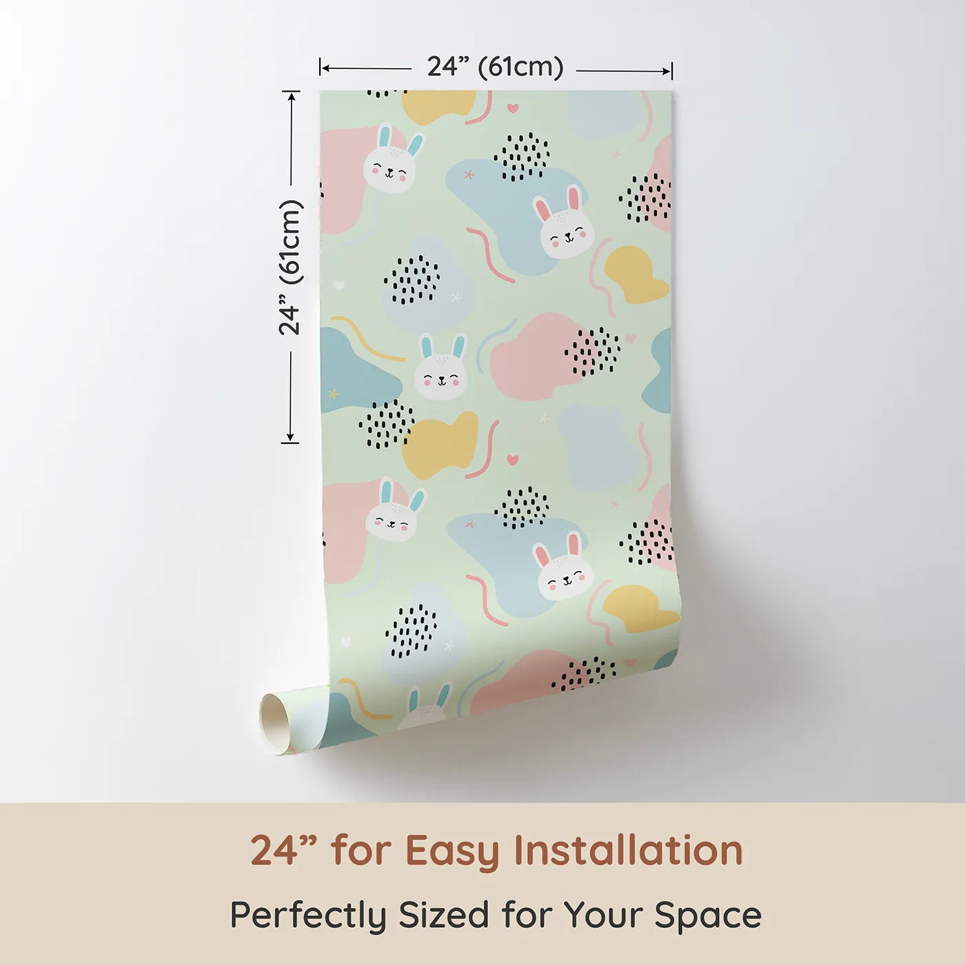 Dimension view of Whimsy Tots Bunny Bounce Abstract Wallpaper in Mint Green (W3443C). Printed in 24-inch-wide panel for easy installation. Smiling rabbits and playful shapes hop across a breezy mint sky.