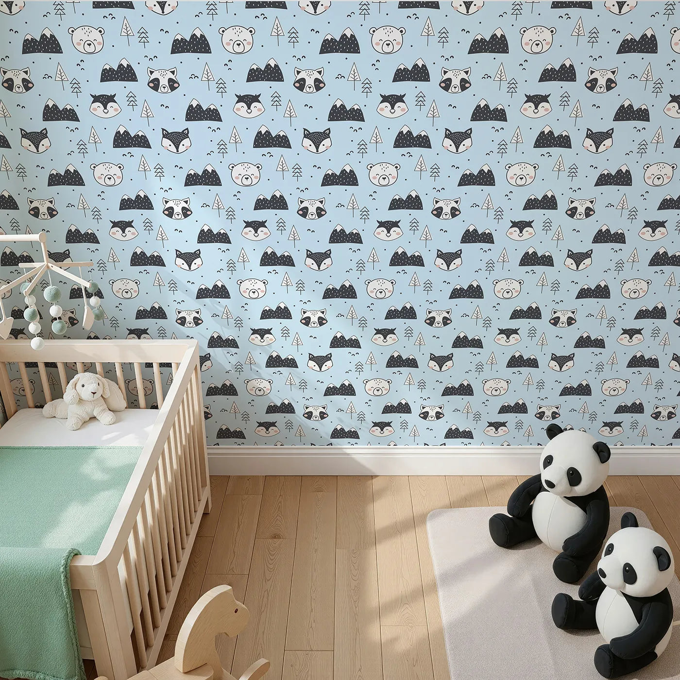 Top-Down view of Whimsy Tots' Woodland Peekaboo Friends Wallpaper in Blue (W3451E).Smiling woodland animals peek through trees and snowy peaks under a blue sky.