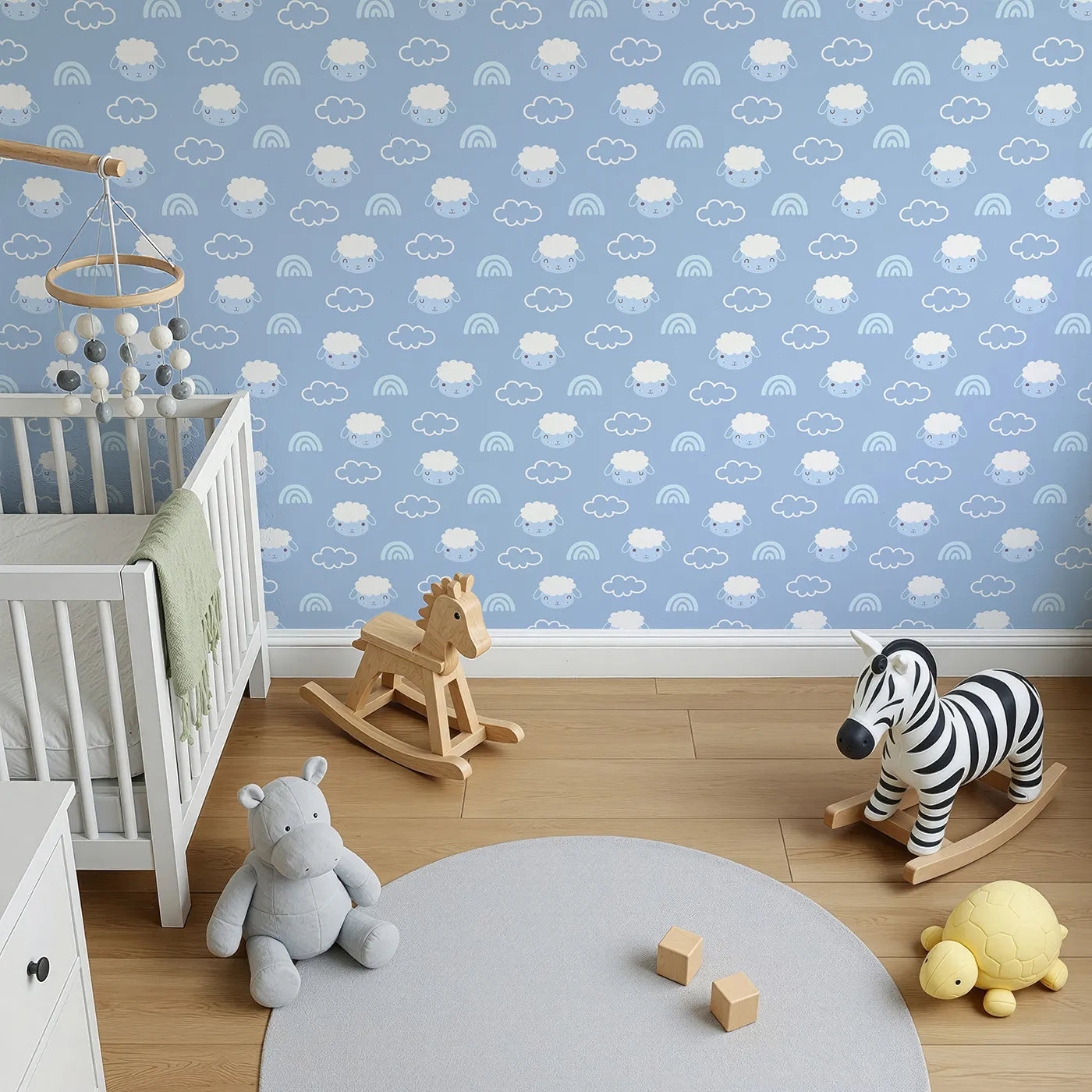 Top-Down view of Whimsy Tots' Sleepy Lamb Skies Wallpaper in Sky Blue (W3452C).Fluffy lambs, clouds, and rainbows drift across a peaceful sky blue backdrop.