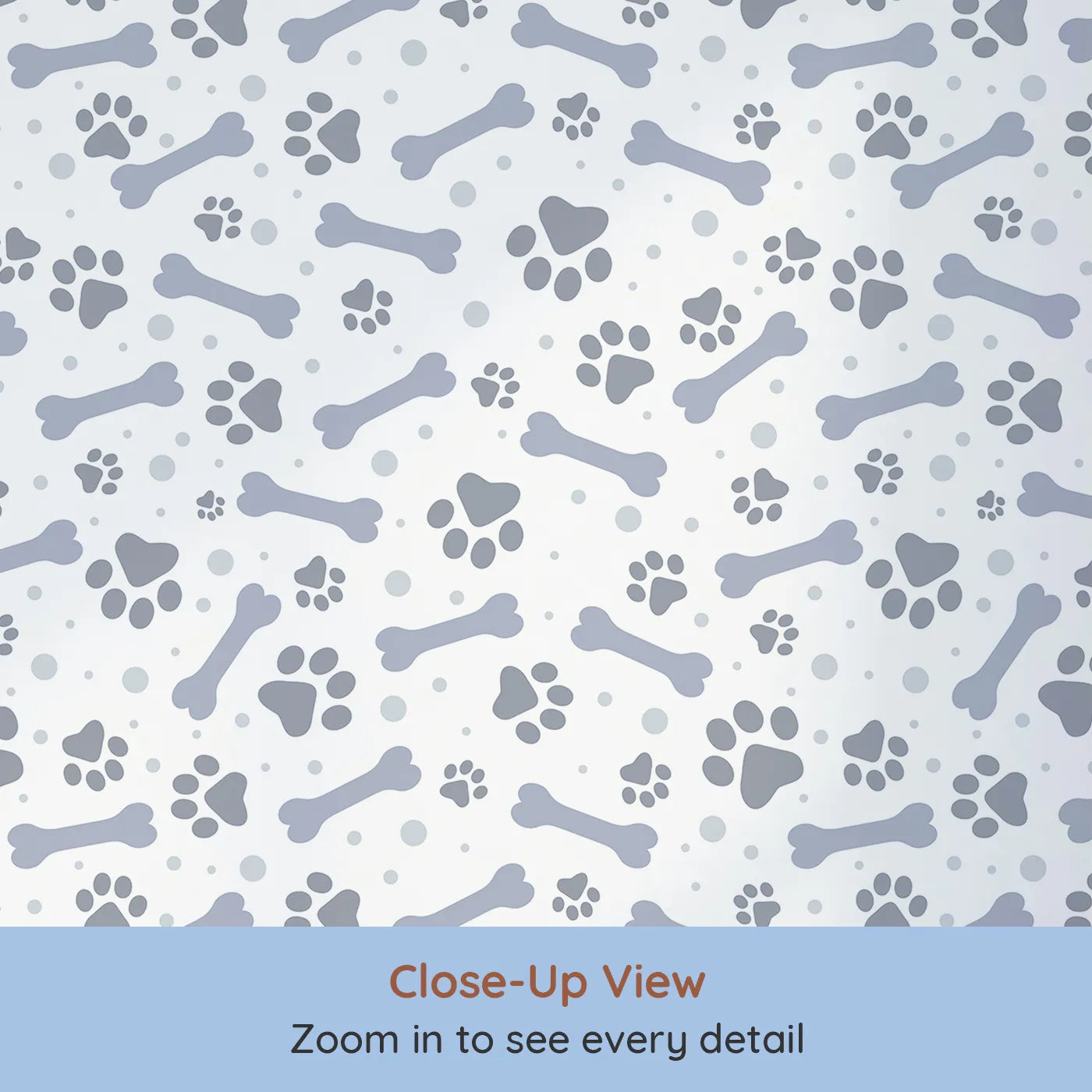 Close-up view of Whimsy Tots' Puppy Paw Parade Wallpaper in Blue Gray (W3462D).Bluish-gray paw prints and bones play softly across a clean white sky.