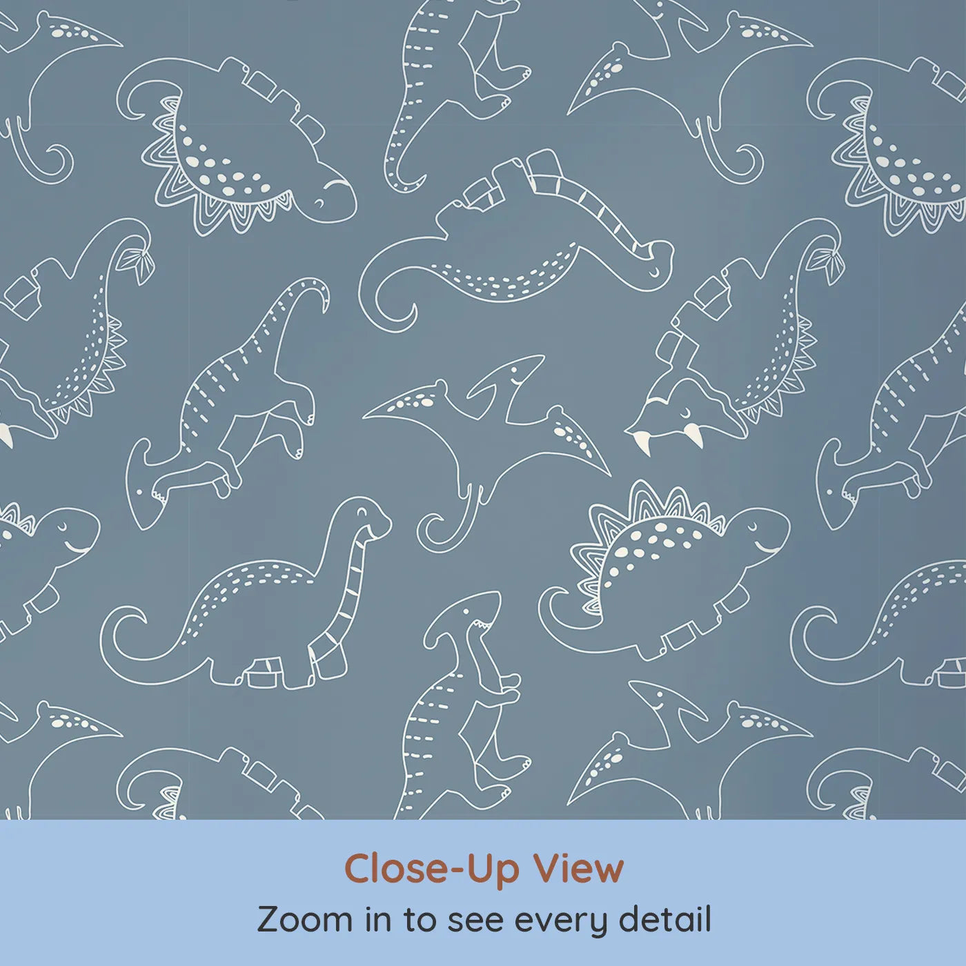 Close-up view of Whimsy Tots' Dino Scribble Parade Wallpaper in Denim (W3466A).Happy dinos march playfully across a soft denim blue backdrop.