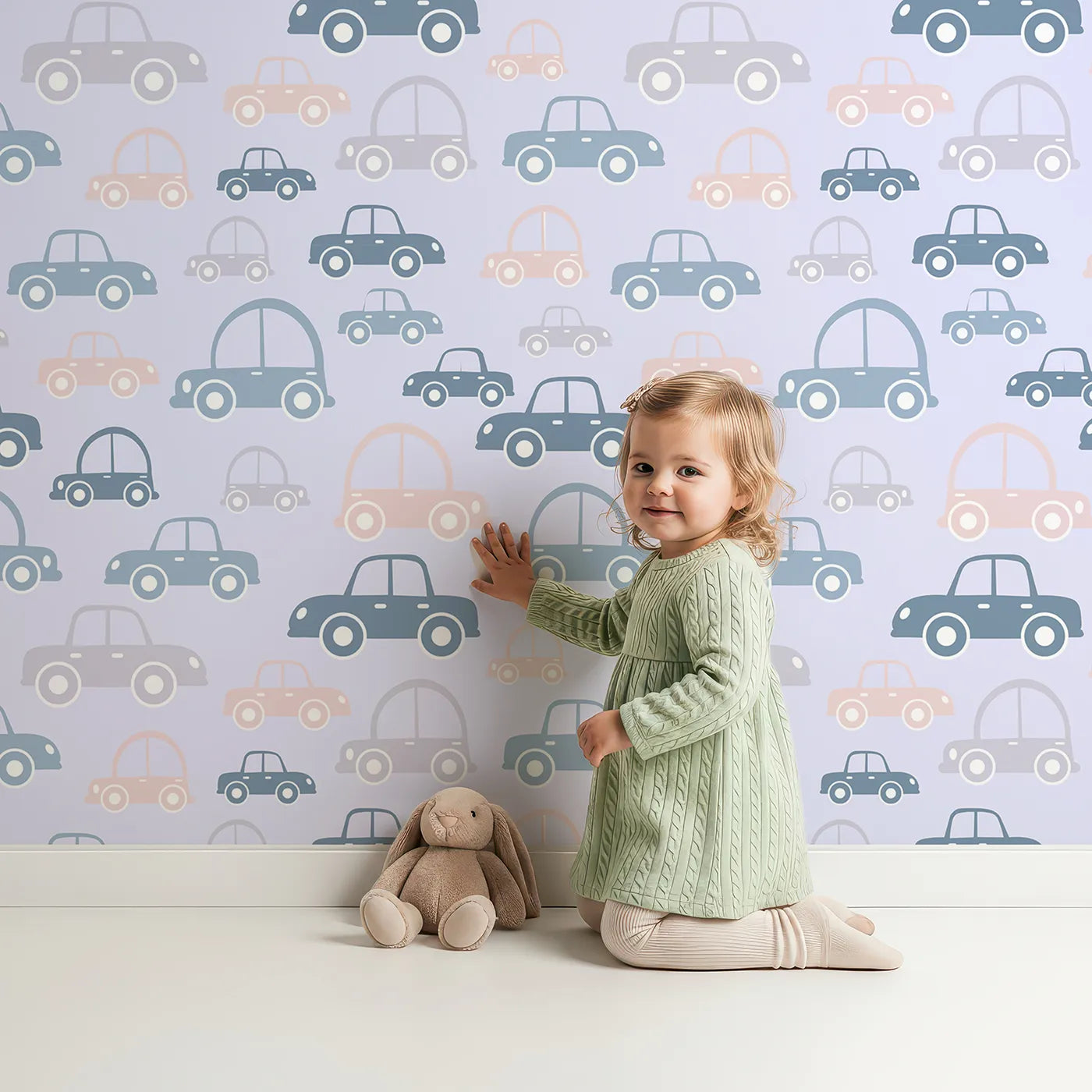 Lovely child standing in front of Whimsy Tots Tiny Toot Toot Cars Wallpaper in Lilac Lavender with car, vehicle, pastel, transportation in design.