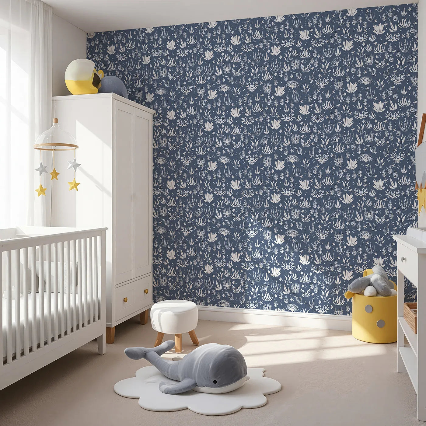 Angled view of Whimsy Tots' Coral Garden Dance Wallpaper in Deep Indigo (W3476E).Sea life silhouettes drift peacefully through a deep indigo sea.