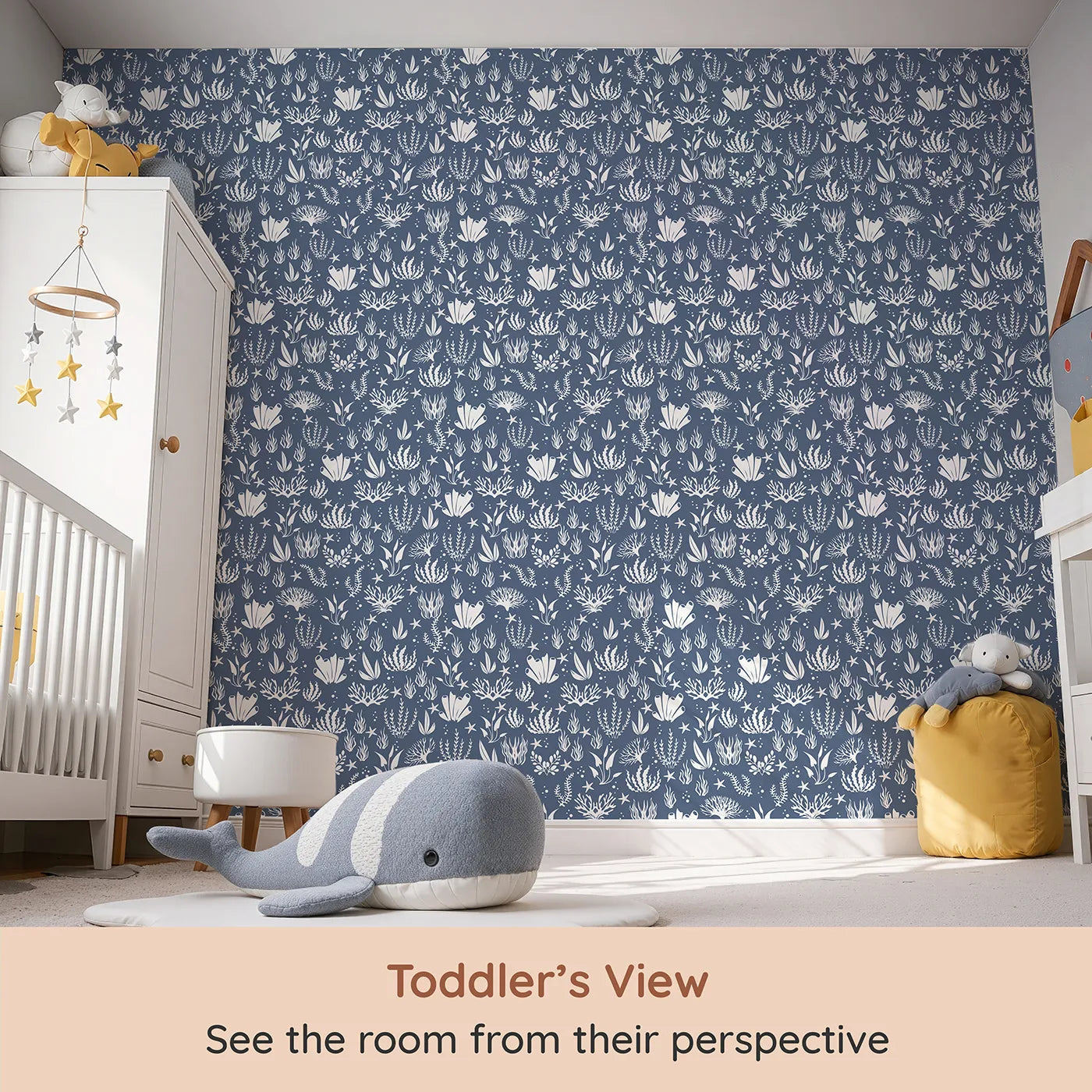 Whimsy Tots Coral Garden Dance Wallpaper in Deep Indigo (W3476E) from your child's view.Sea life silhouettes drift peacefully through a deep indigo sea.