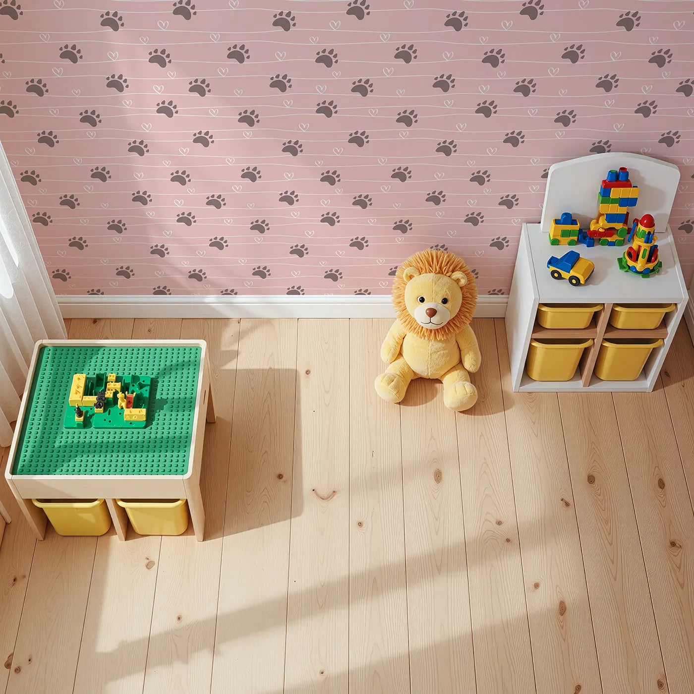 Top-Down view of Whimsy Tots' Bear Hug Trail Wallpaper in Petal Pink (W3493A).Gentle bear prints and hearts dance across a warm blush pink sky.