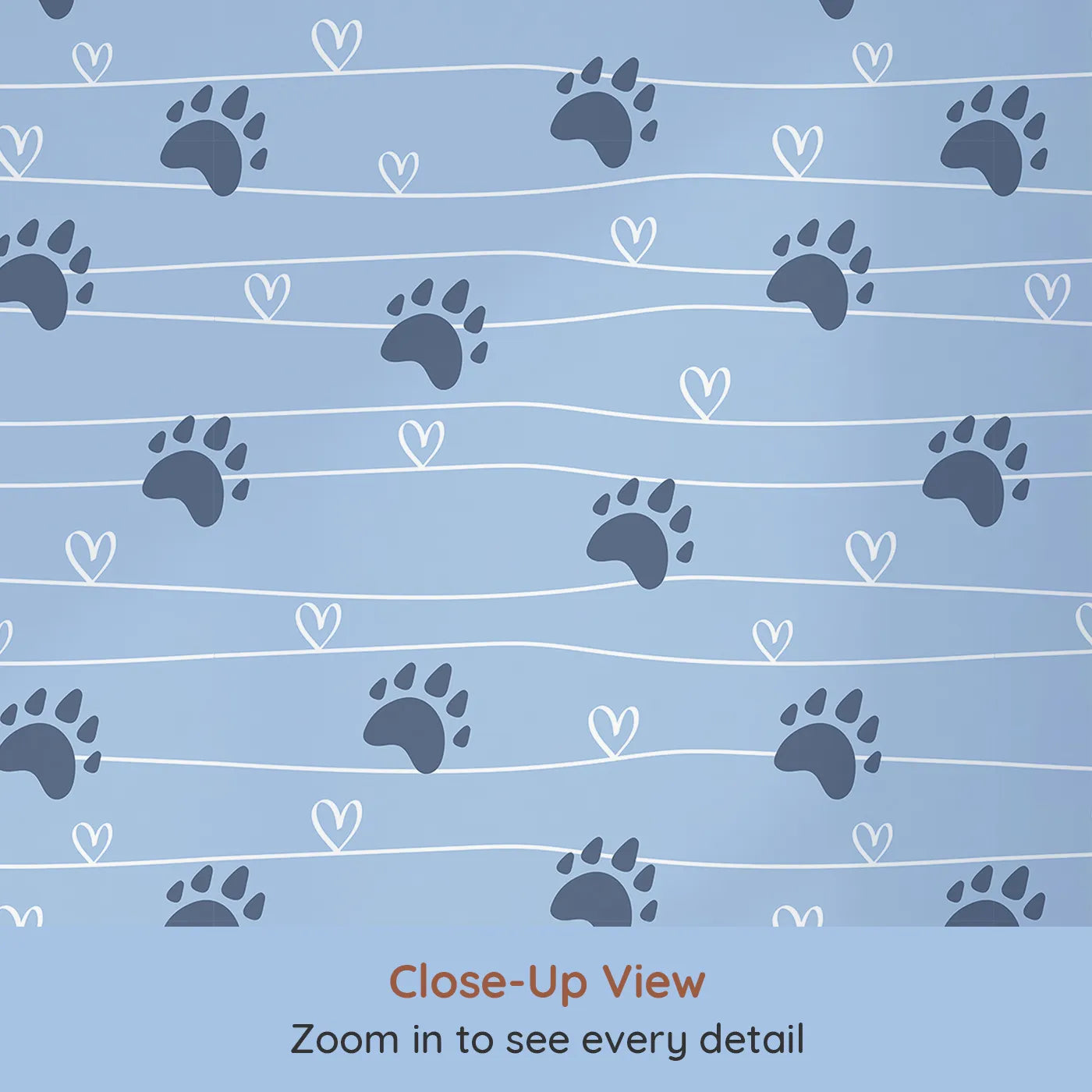 Close-up view of Whimsy Tots' Bear Hug Trail Wallpaper in Sky Blue (W3493D).Dark bear tracks and white hearts dance across a sky-blue trail.