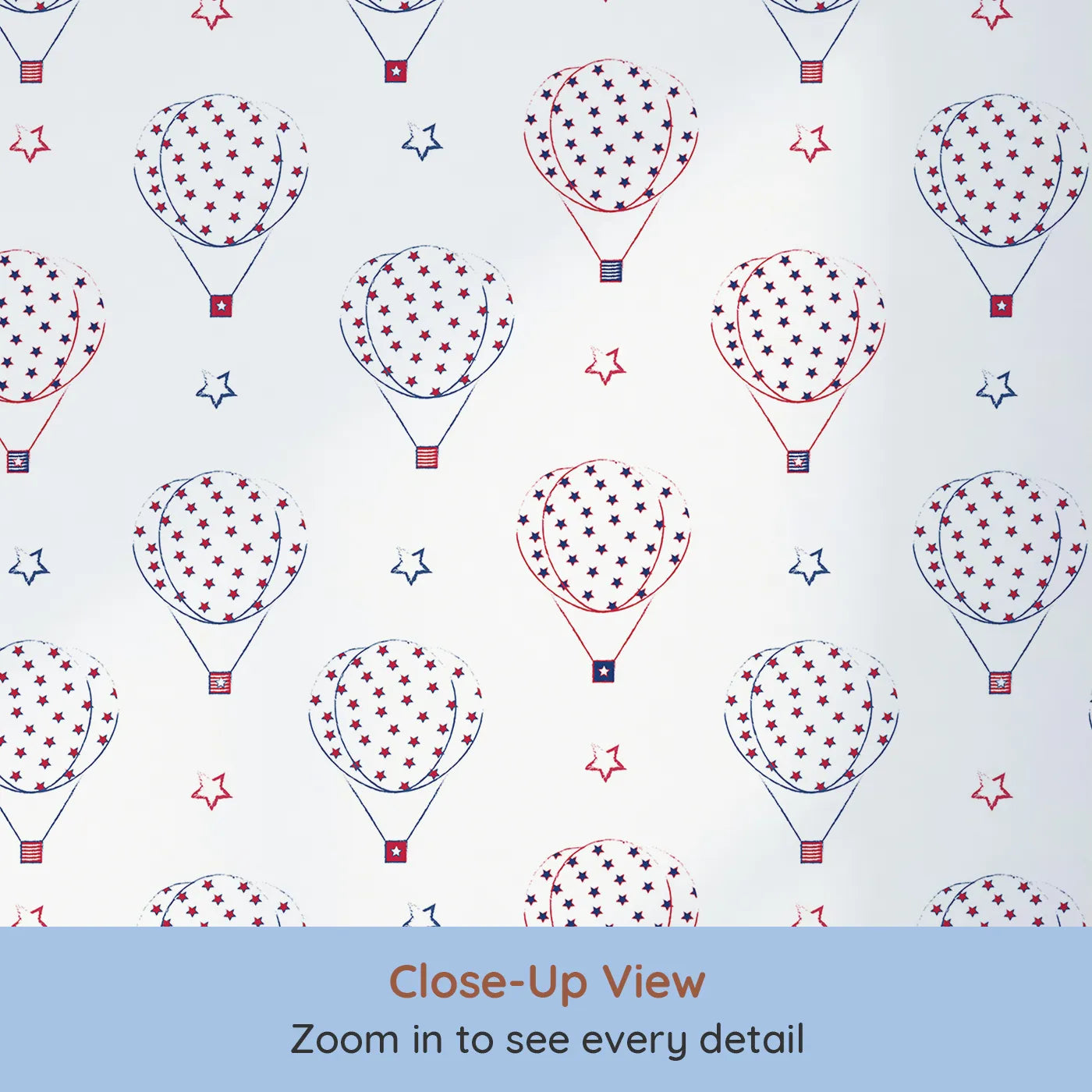 Close-up view of Whimsy Tots' Starry Balloon Festival Wallpaper (W3499).Patriotic hot air balloons float gently through a sky of red, white, and blue.