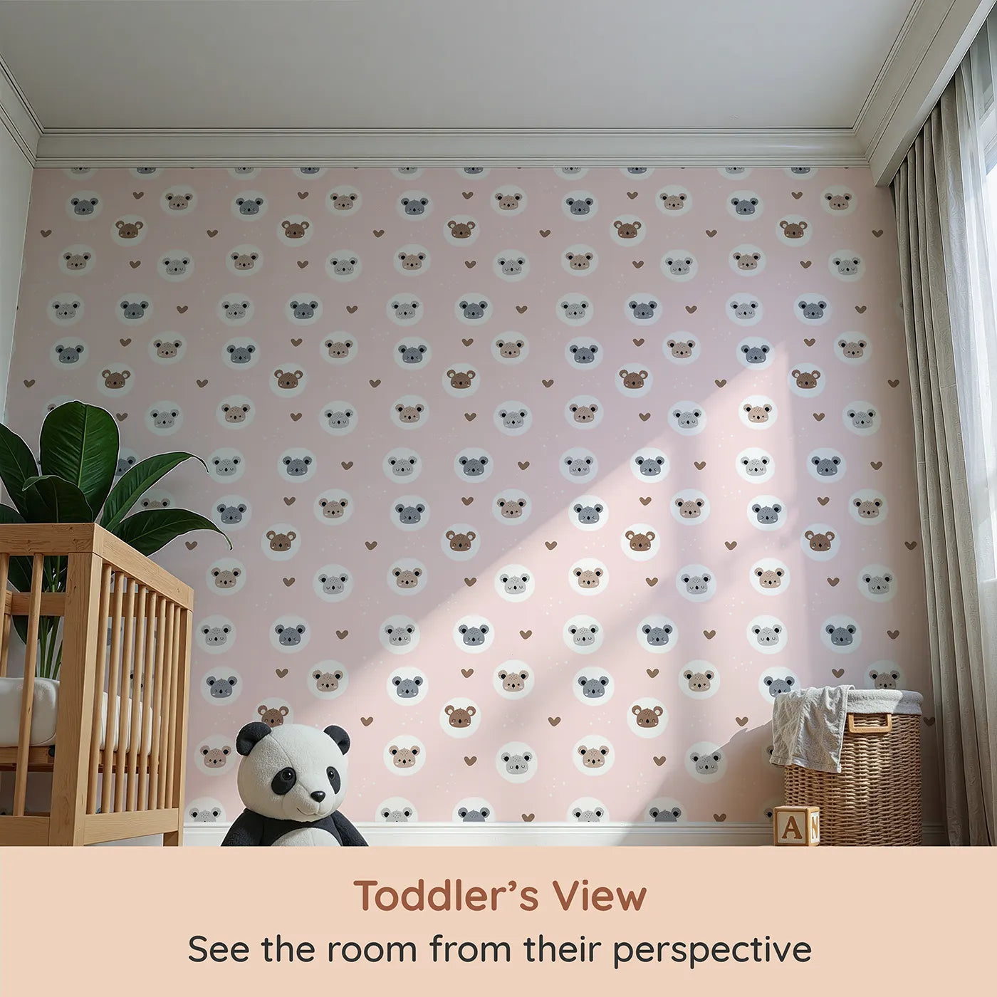 Whimsy Tots Cuddly Koala Circle Wallpaper in Blush Pink (W3500A) from your child's view.Sweet koala faces peek from soft circles on a soothing pink sky.