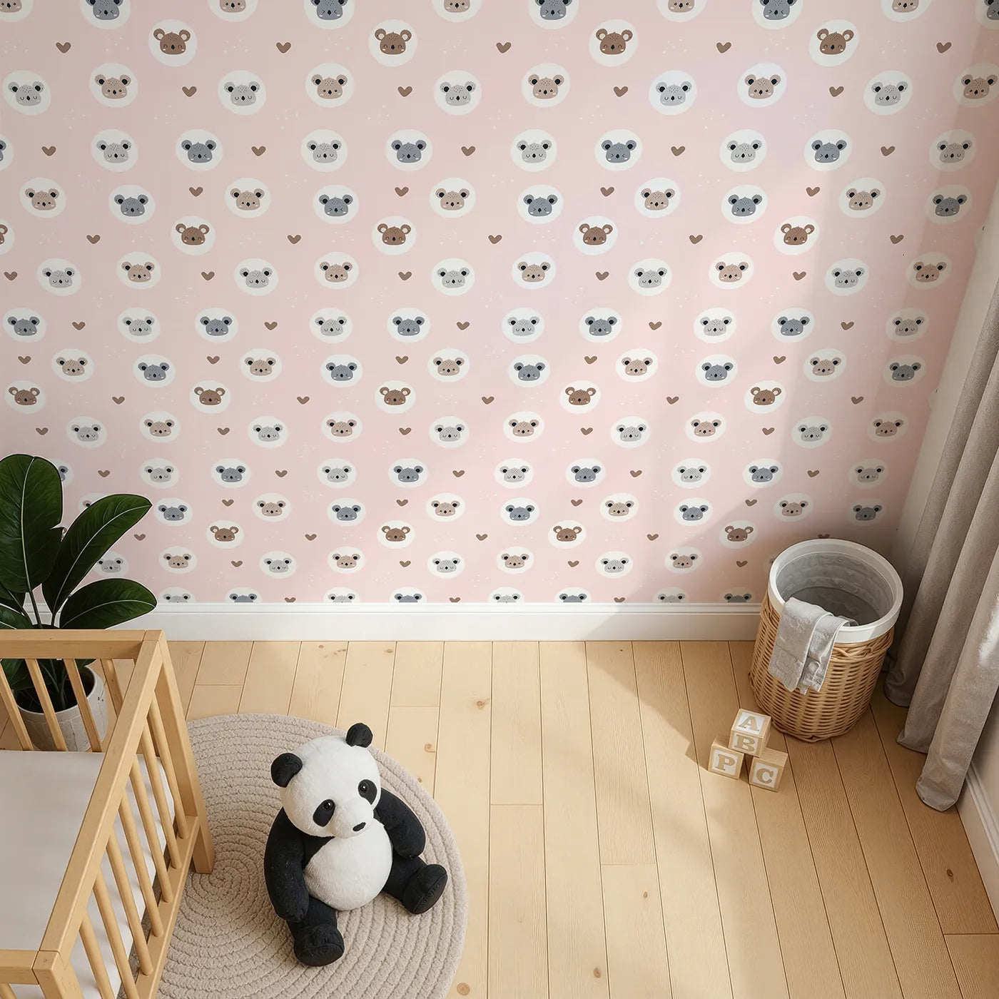 Top-Down view of Whimsy Tots' Cuddly Koala Circle Wallpaper in Blush Pink (W3500A).Sweet koala faces peek from soft circles on a soothing pink sky.