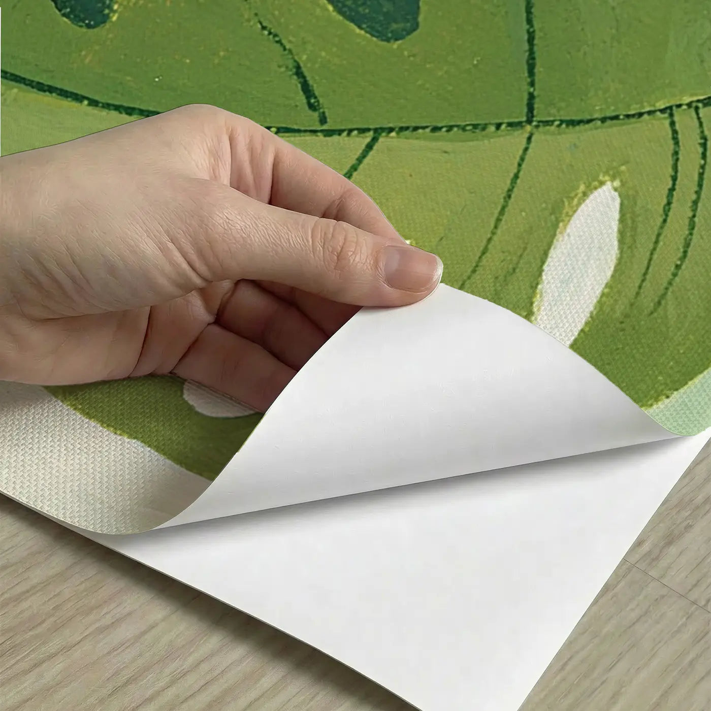 Peel-and-stick detail of Graphic Monstera Leaf Grid Wainscoting Wallpaper by Whimsy Tots
