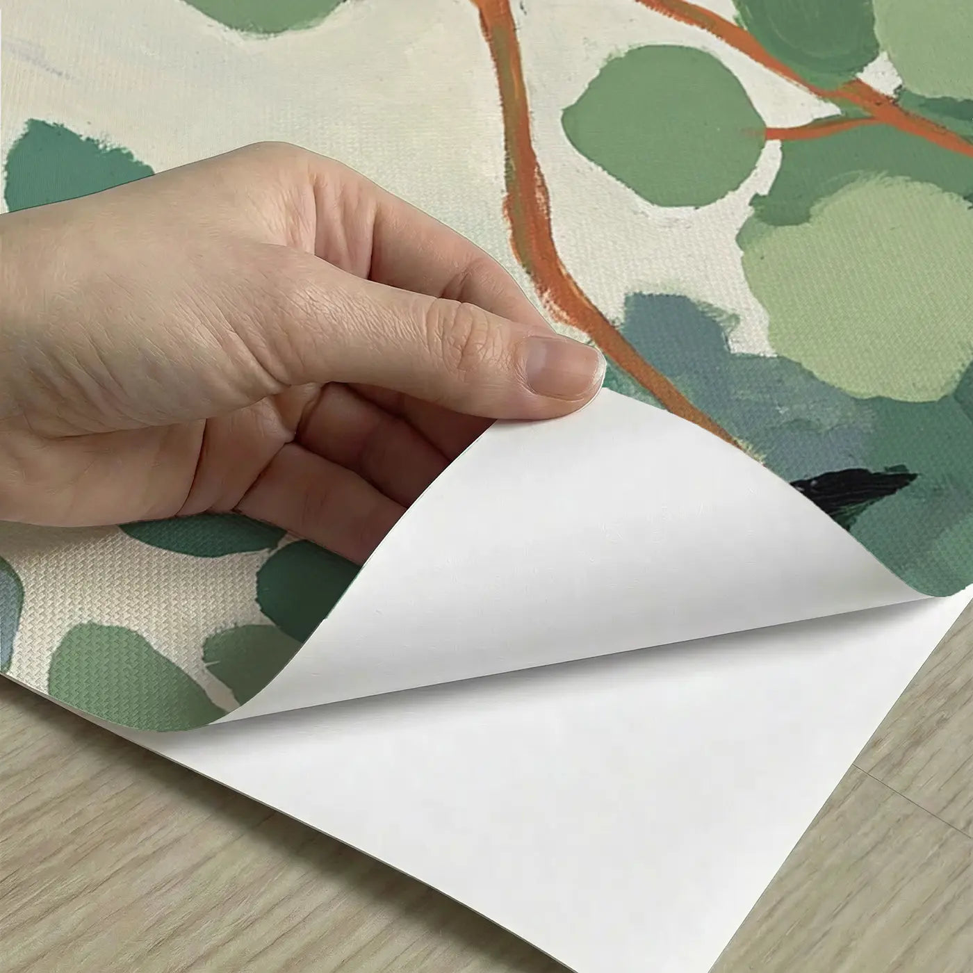 Peel-and-stick detail of Bold Eucalyptus Branch Row Wainscoting Wallpaper by Whimsy Tots