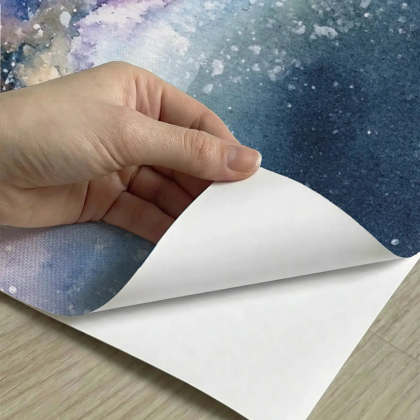 Peel-and-stick detail of Milky Way Watercolor Streak Wainscoting Wallpaper by Whimsy Tots