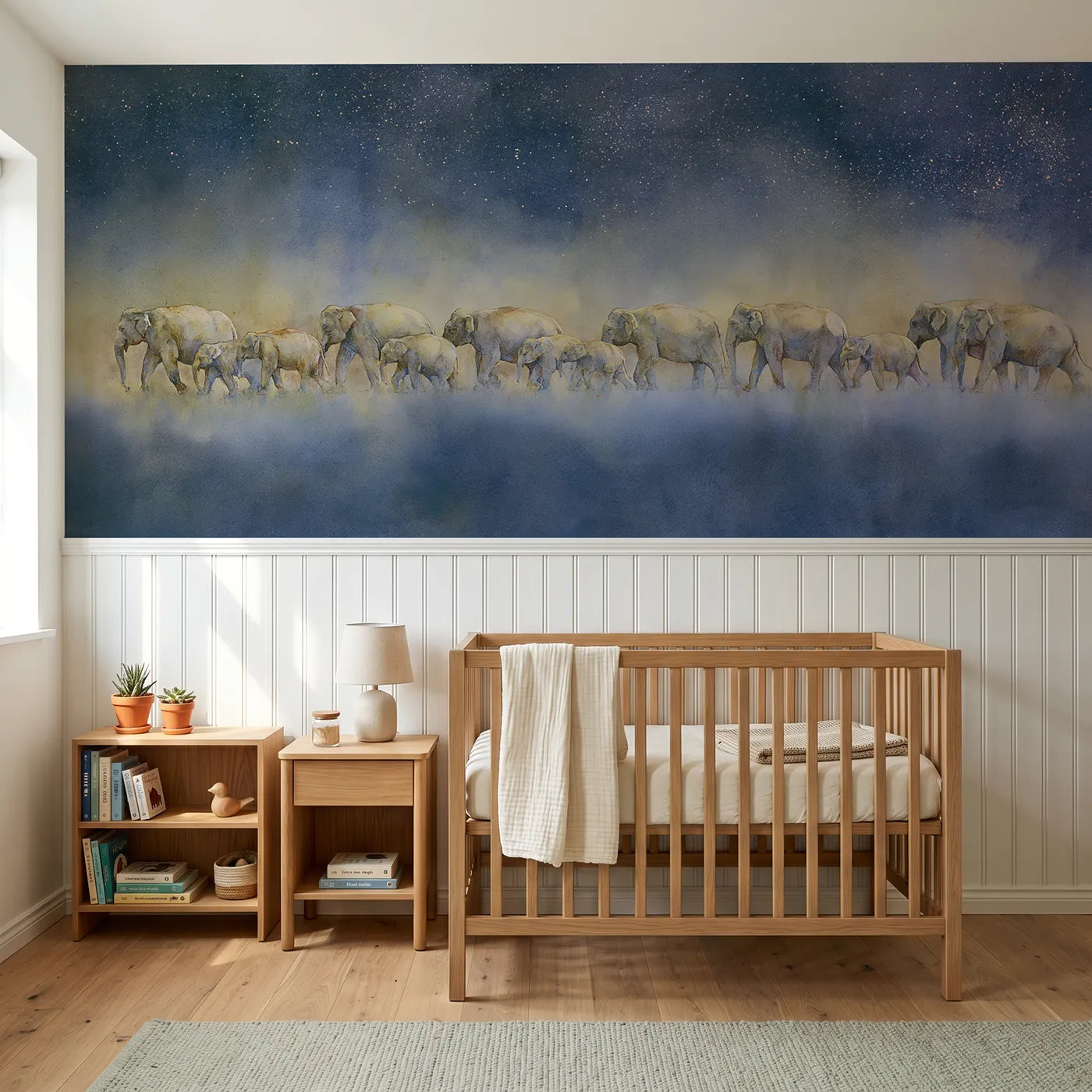 Watercolor wainscoting wallpaper of an elephant herd under a starry sky for a nursery by Whimsy Tots