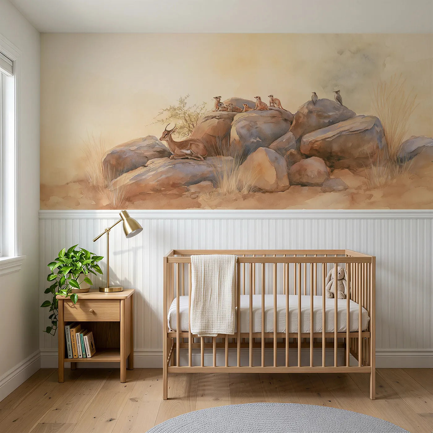 Watercolor wainscoting wallpaper of animals gathered on sunrise rocks for a nursery by Whimsy Tots