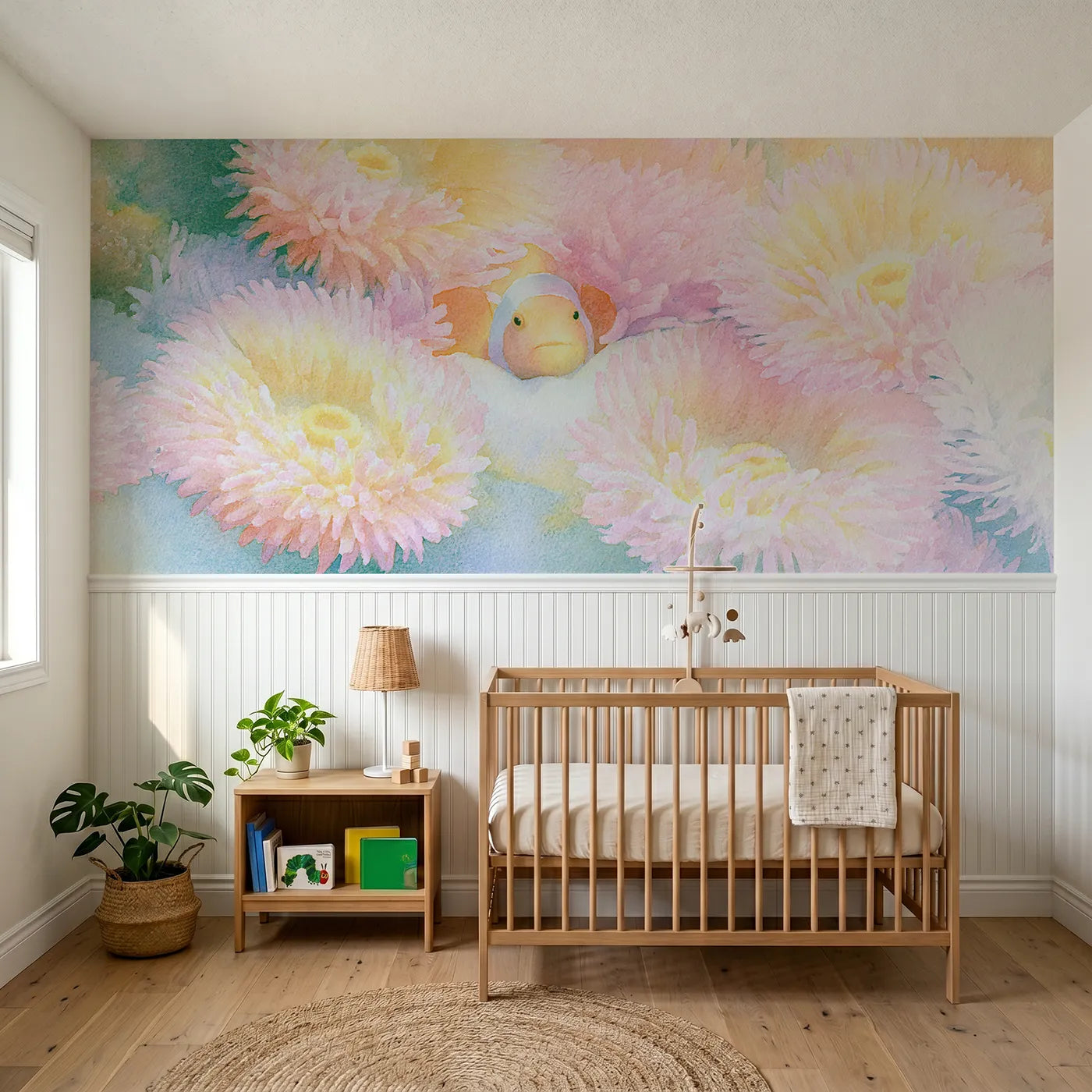Soft pastel wainscoting wallpaper of a clownfish nestled in an anemone by Whimsy Tots