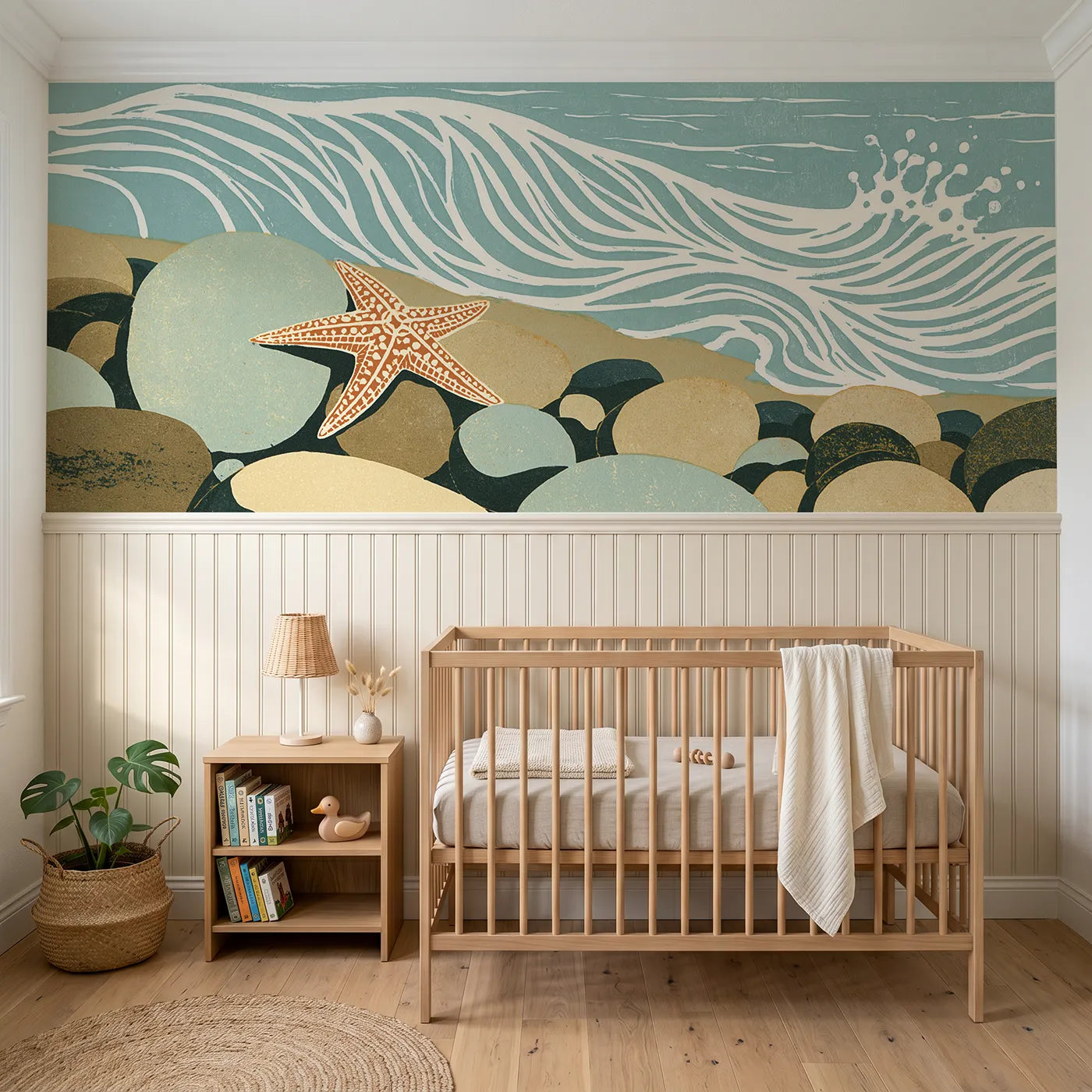 Block print wainscoting wallpaper of a carved starfish among pebbles by Whimsy Tots
