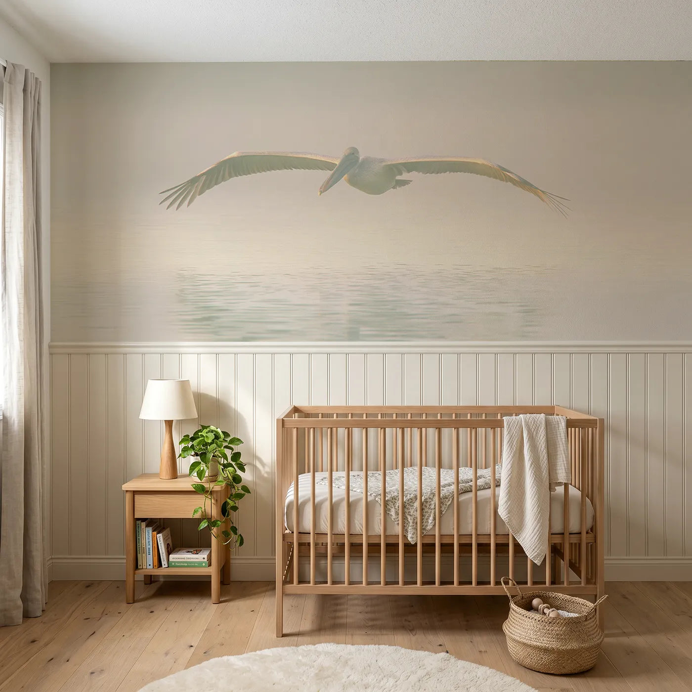 Soft pastel wainscoting wallpaper of a pelican skimming dawn water by Whimsy Tots