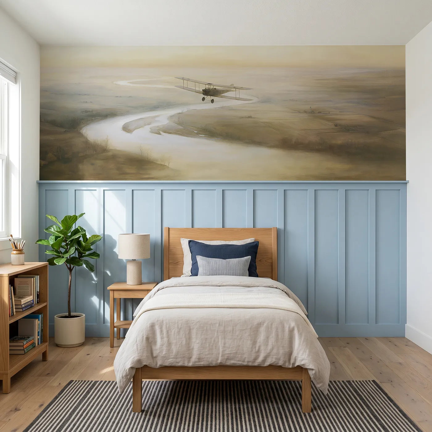 Watercolor wainscoting wallpaper of a biplane following a river by Whimsy Tots