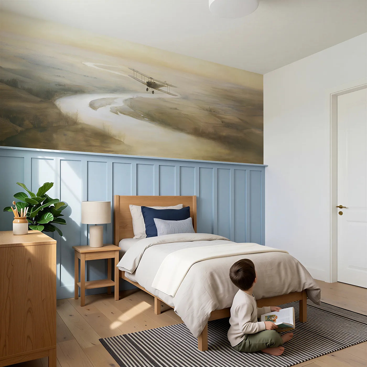 Child reading near Biplane Follows The River Wainscoting Wallpaper by Whimsy Tots