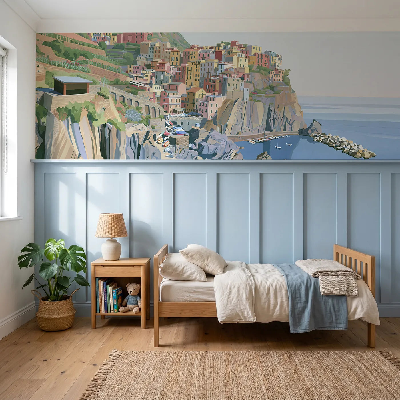Modern illustration wainscoting wallpaper of a pastel village on a cliff by Whimsy Tots