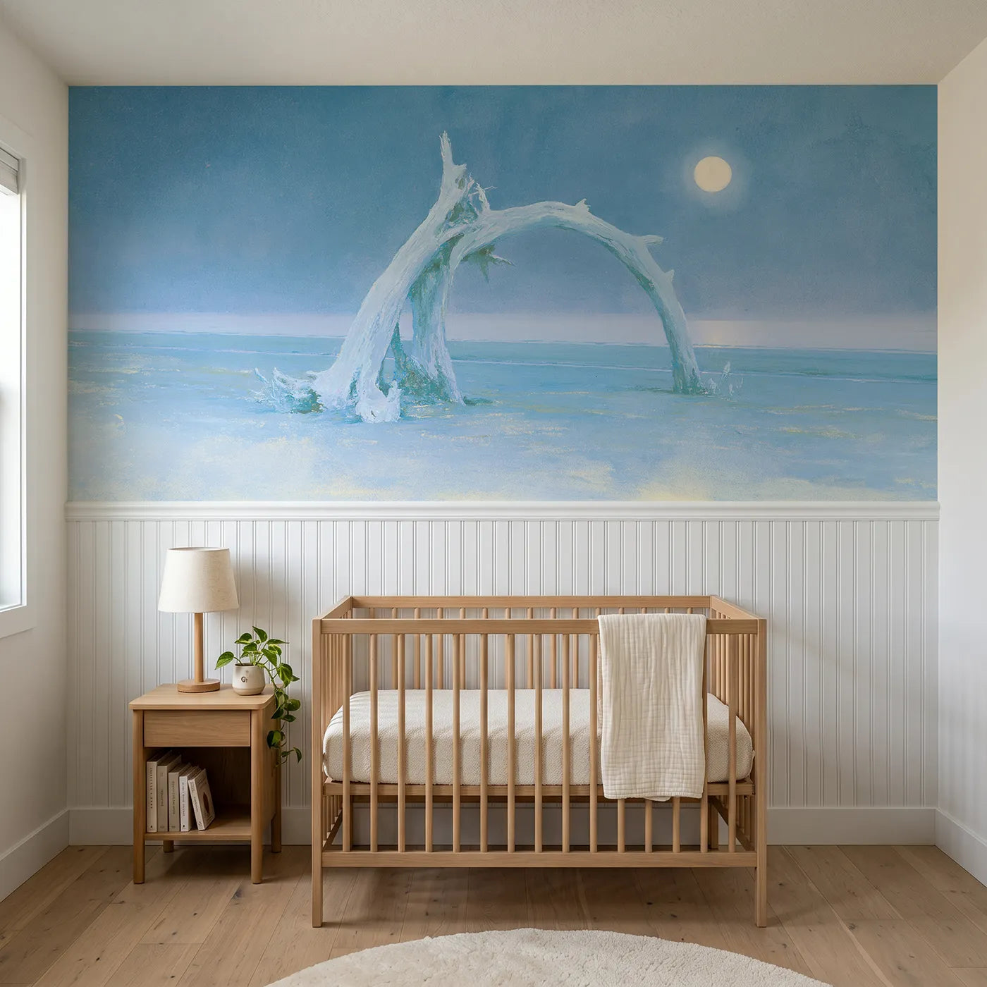 Soft pastel wainscoting wallpaper of a driftwood arch and rising moon by Whimsy Tots