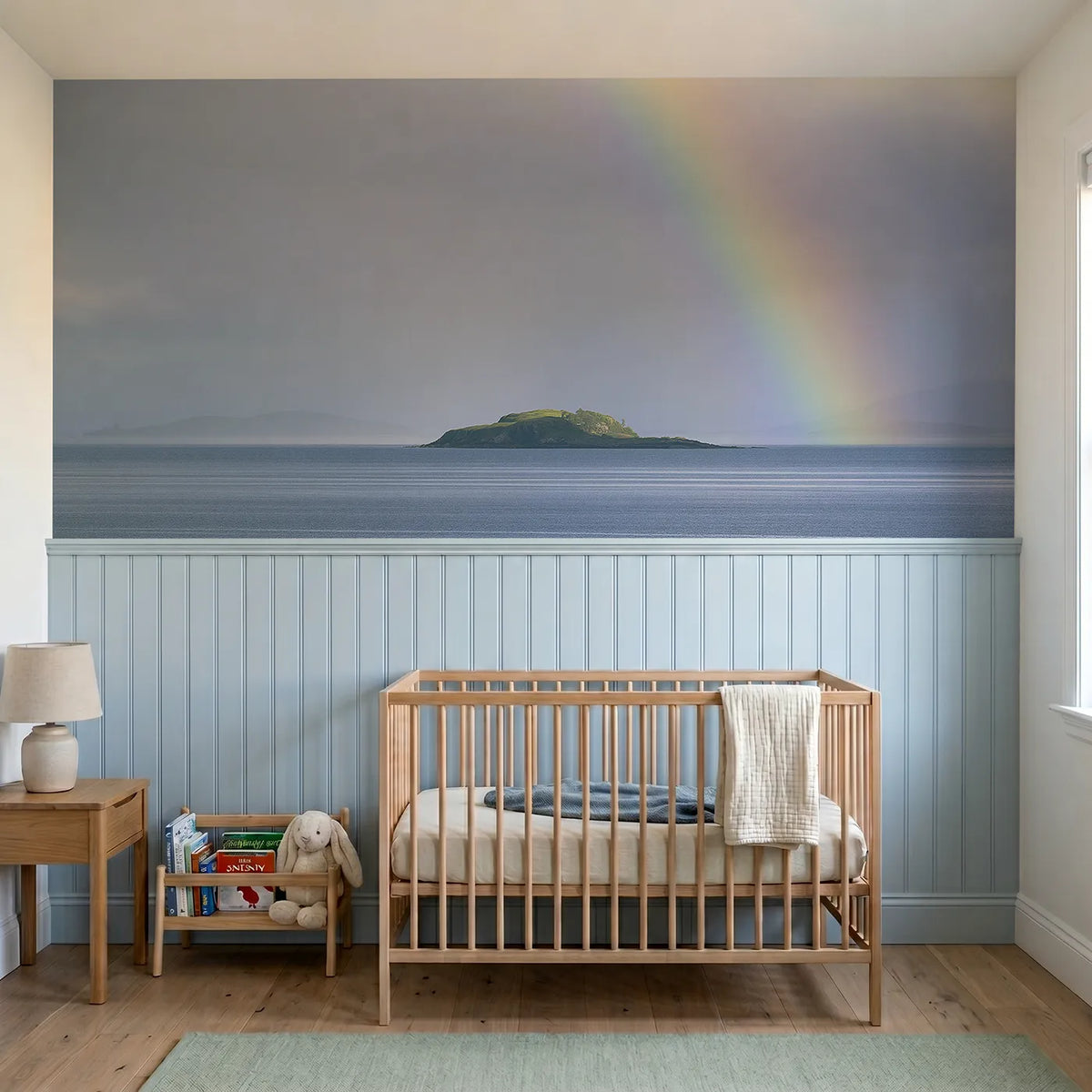 Watercolor wainscoting wallpaper of a rainbow arcing to an island by Whimsy Tots