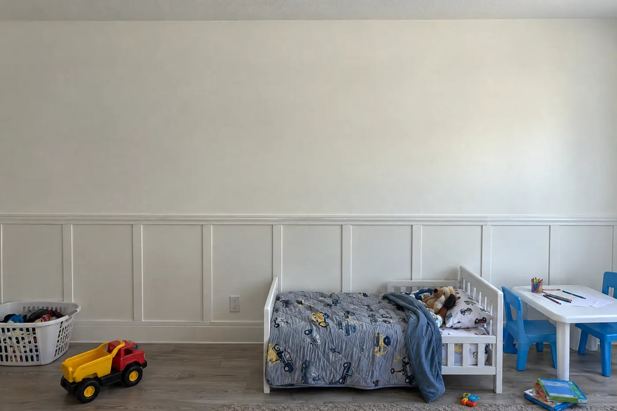 Watercolor wainscoting wallpaper with a zebra, lion cub and hippo, the same room before, by Whimsy Tots