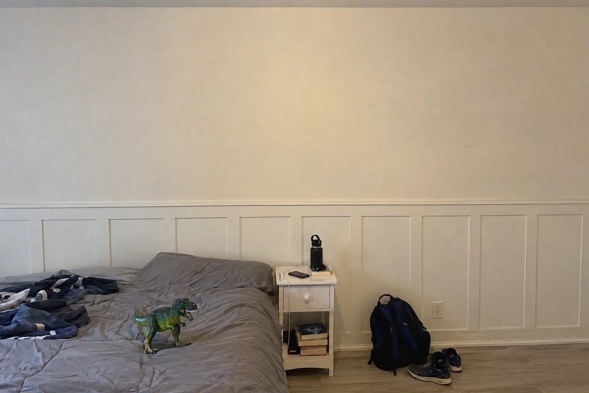 Storybook wainscoting wallpaper with monkeys, a rhino and cub, the same room before, by Whimsy Tots