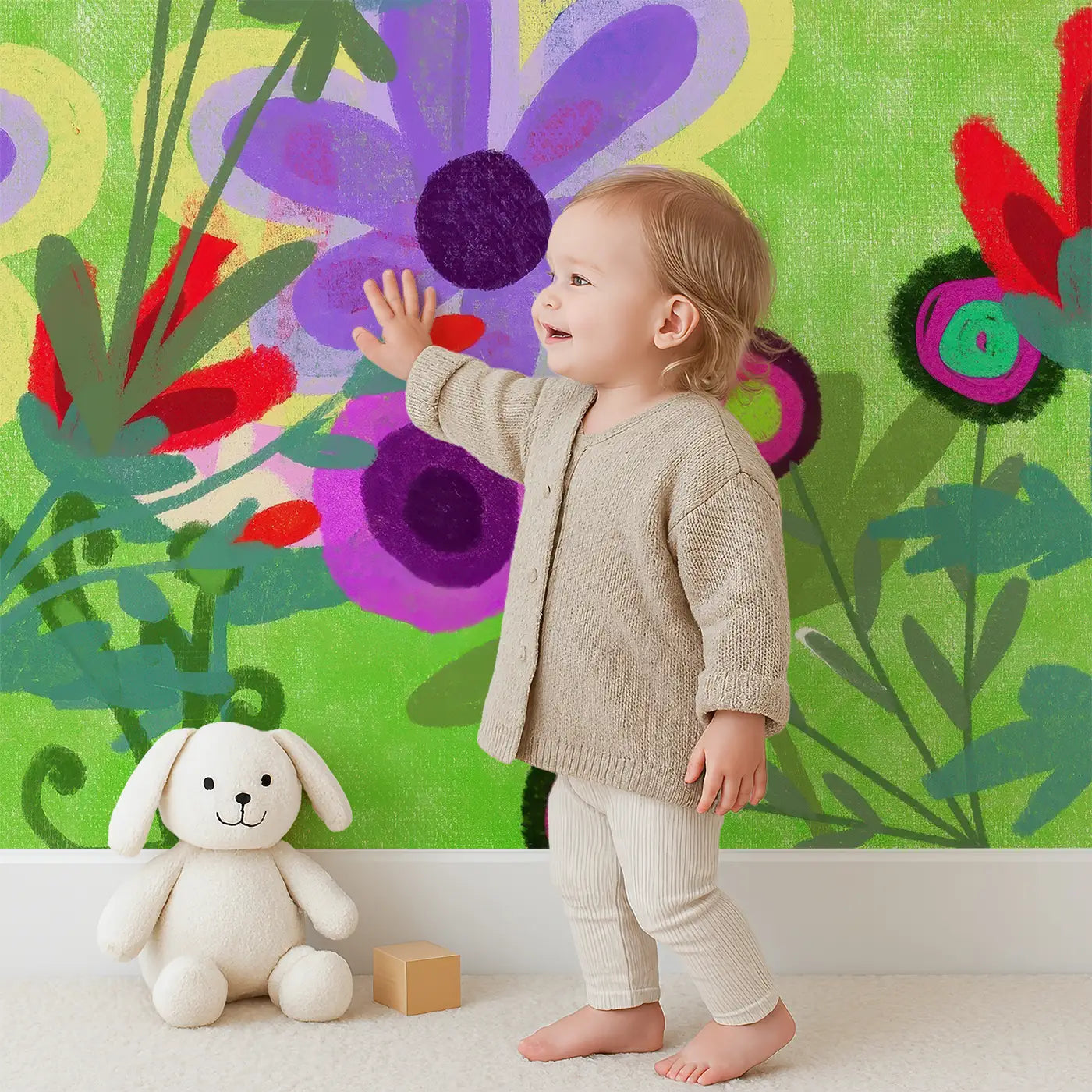 Child in front of Whimsy Tots Fluffy Sheep Meadow Wall Mural with sheep, flower, cloud, hill in design.