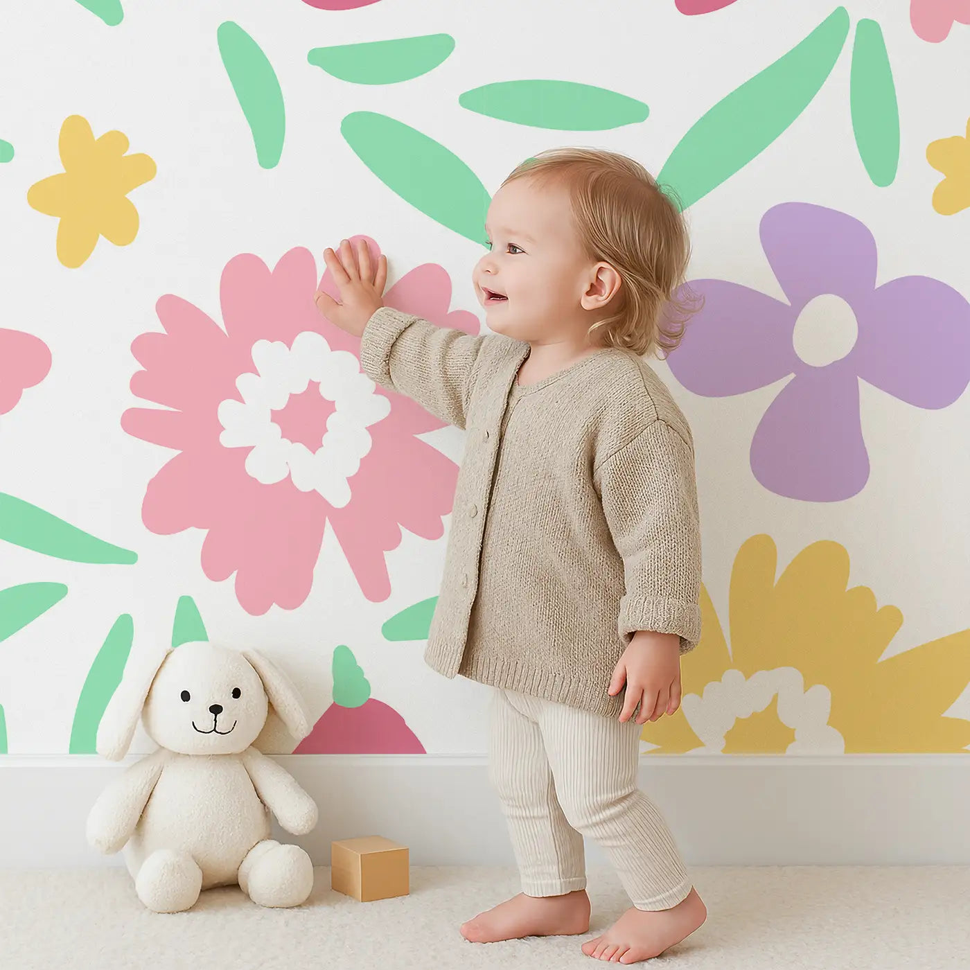 Child in front of Whimsy Tots Cheerful Blossom Garden Wall Mural with flower, blossom, petal, daisy in design.