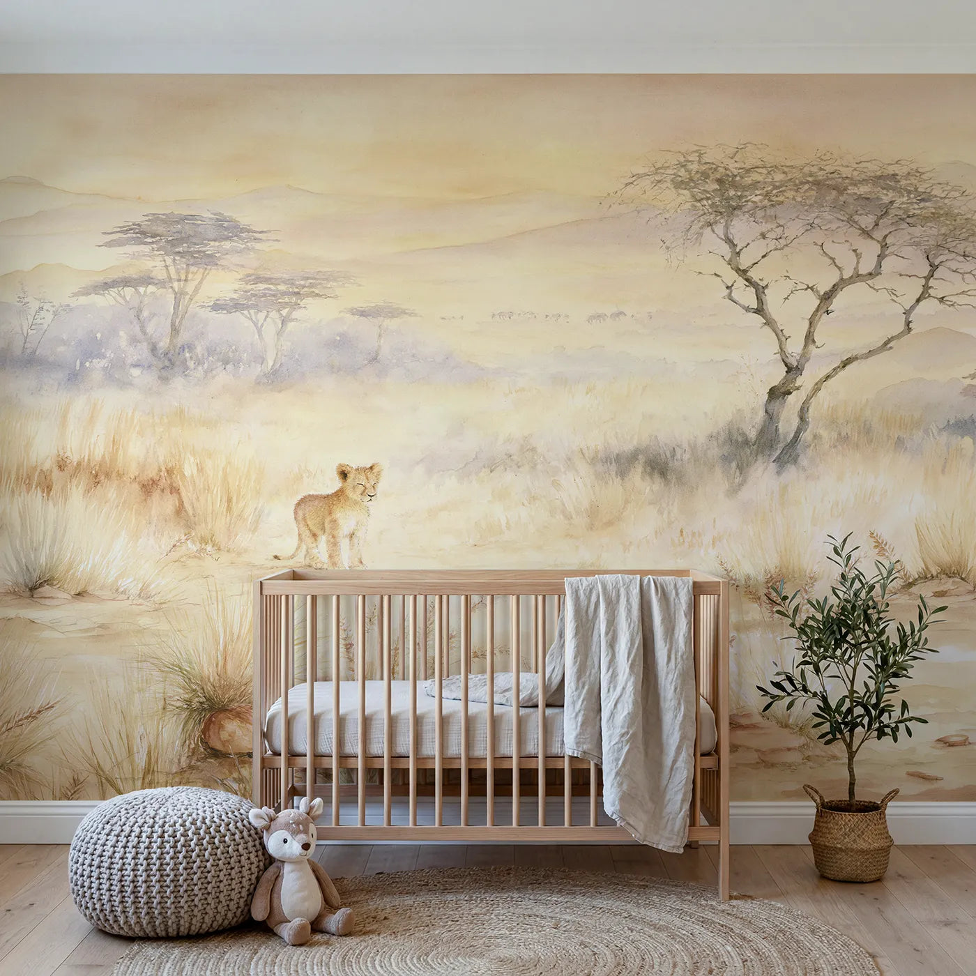 Watercolor wall mural of a lion cub at sunrise by Whimsy Tots