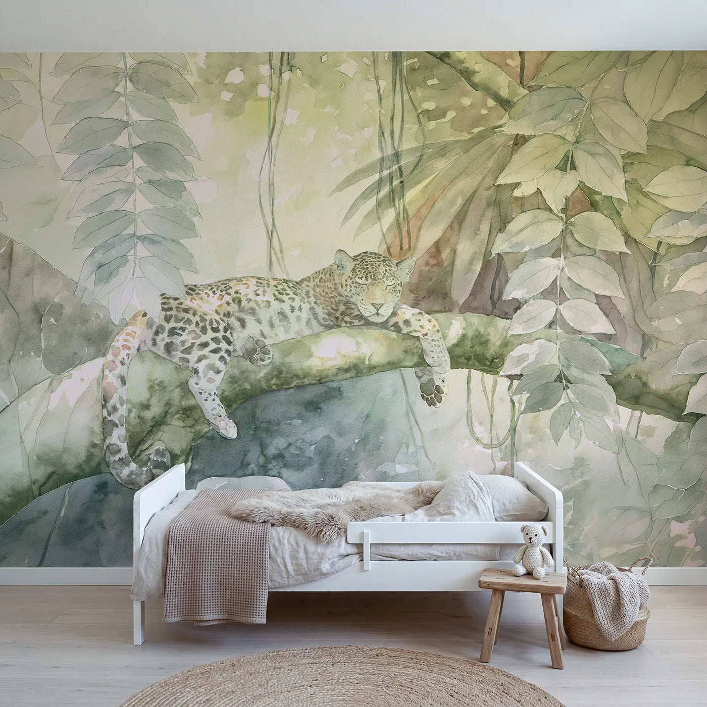 Watercolor wall mural of a sleepy leopard on a branch by Whimsy Tots