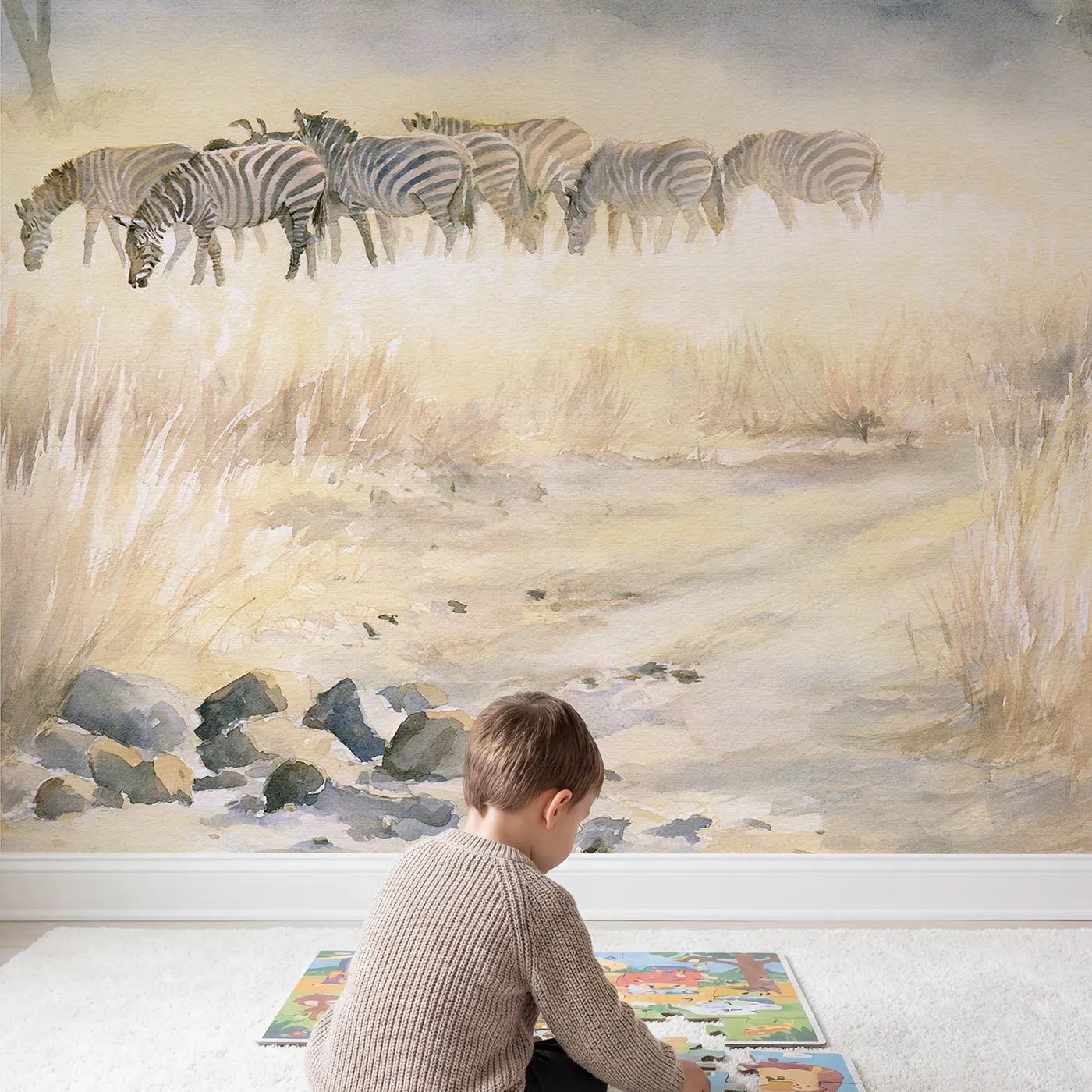 Child in nursery with Zebra Herd Grazing Wallpaper Mural by Whimsy Tots