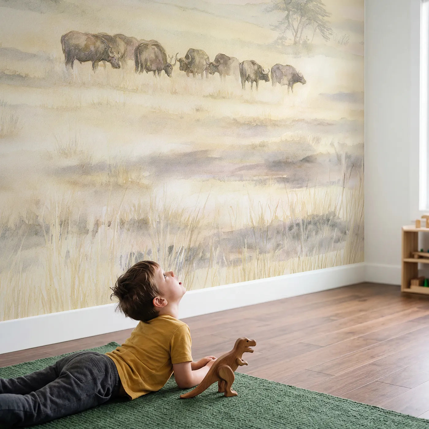 Child in nursery with Buffalo Herd Dusk Wallpaper Mural by Whimsy Tots