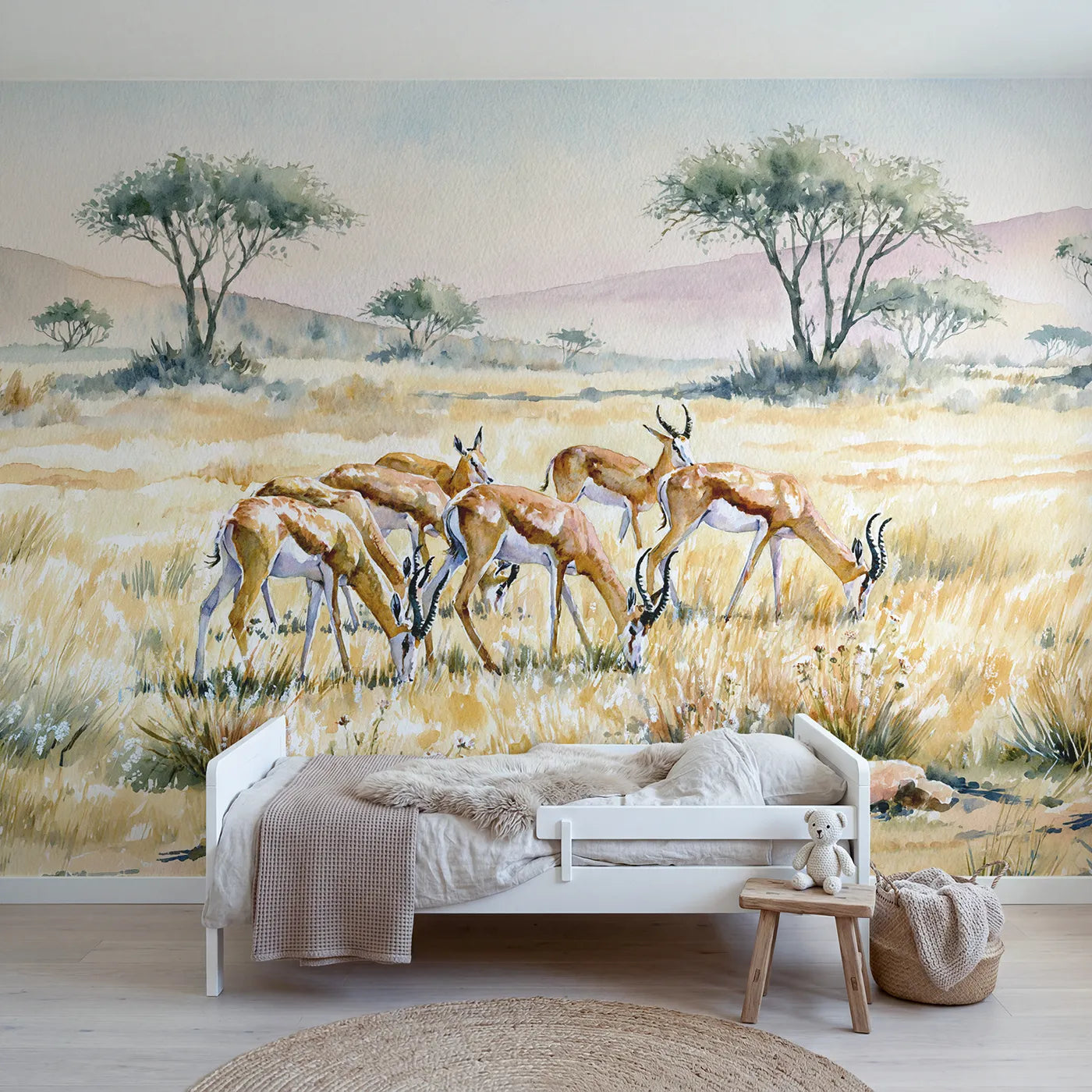 Watercolor wall mural of a gazelle herd grazing by Whimsy Tots