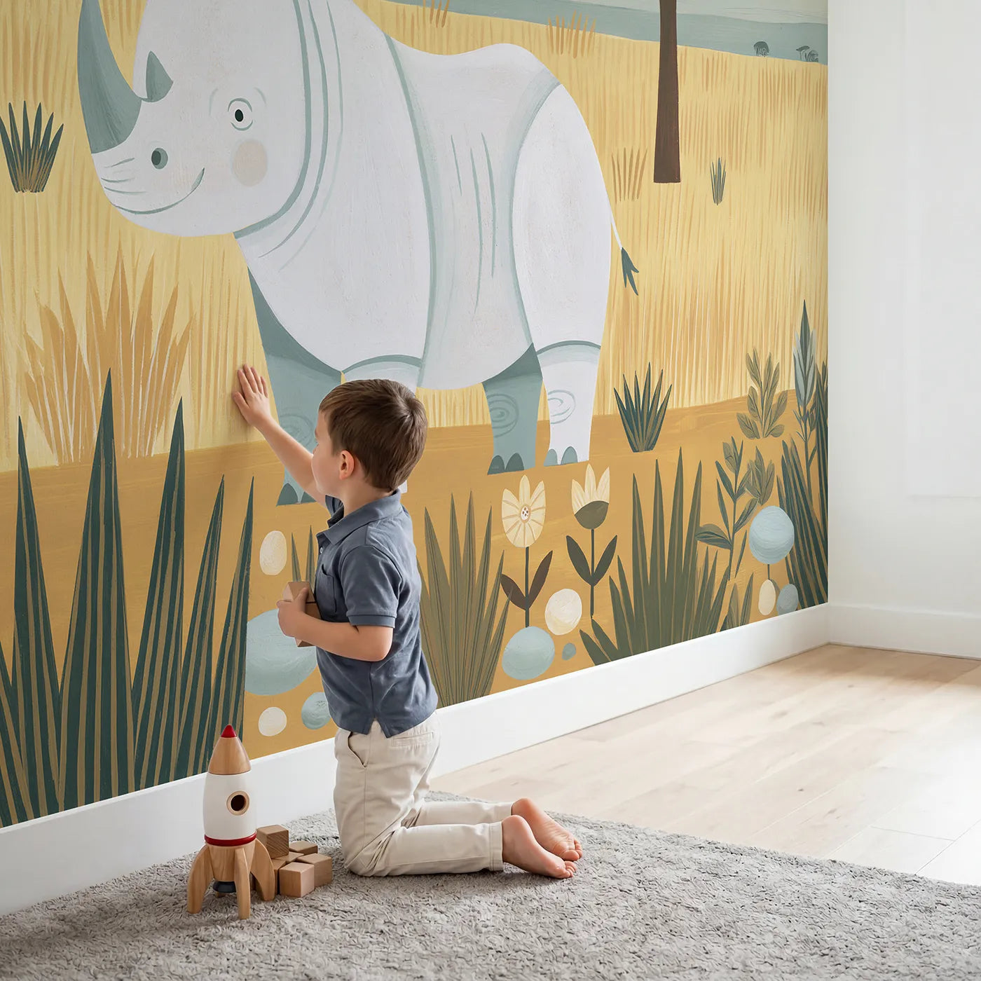 Child in nursery with Folk Rhino Shapes Wallpaper Mural by Whimsy Tots