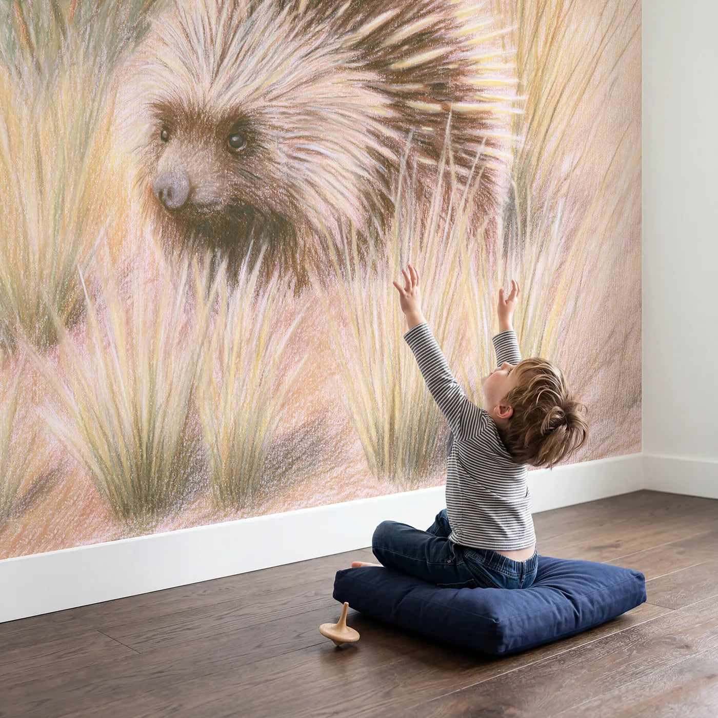 Child in nursery with Little Porcupine Wallpaper Mural by Whimsy Tots