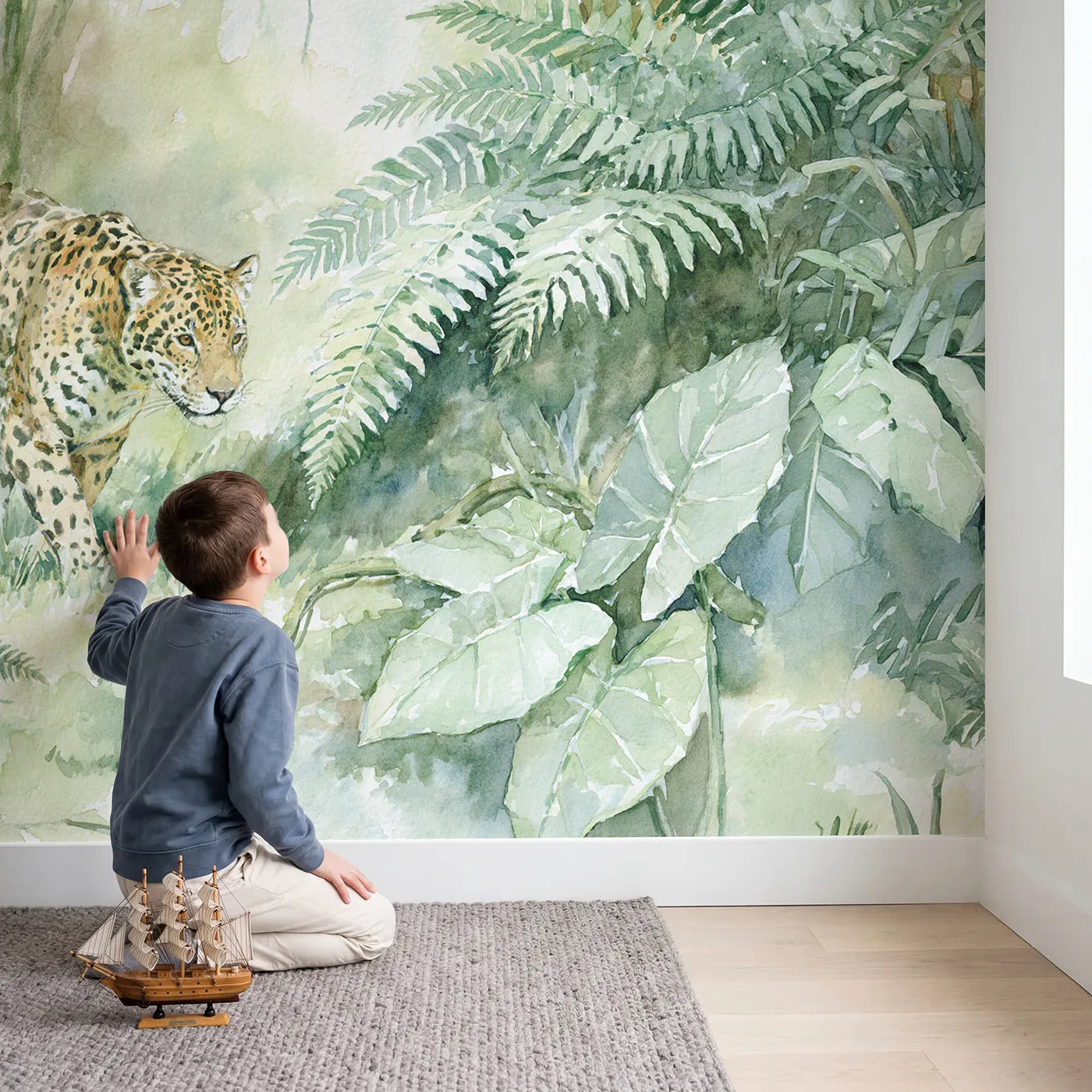 Child in nursery with Jaguar Fern Prowl Wallpaper Mural by Whimsy Tots