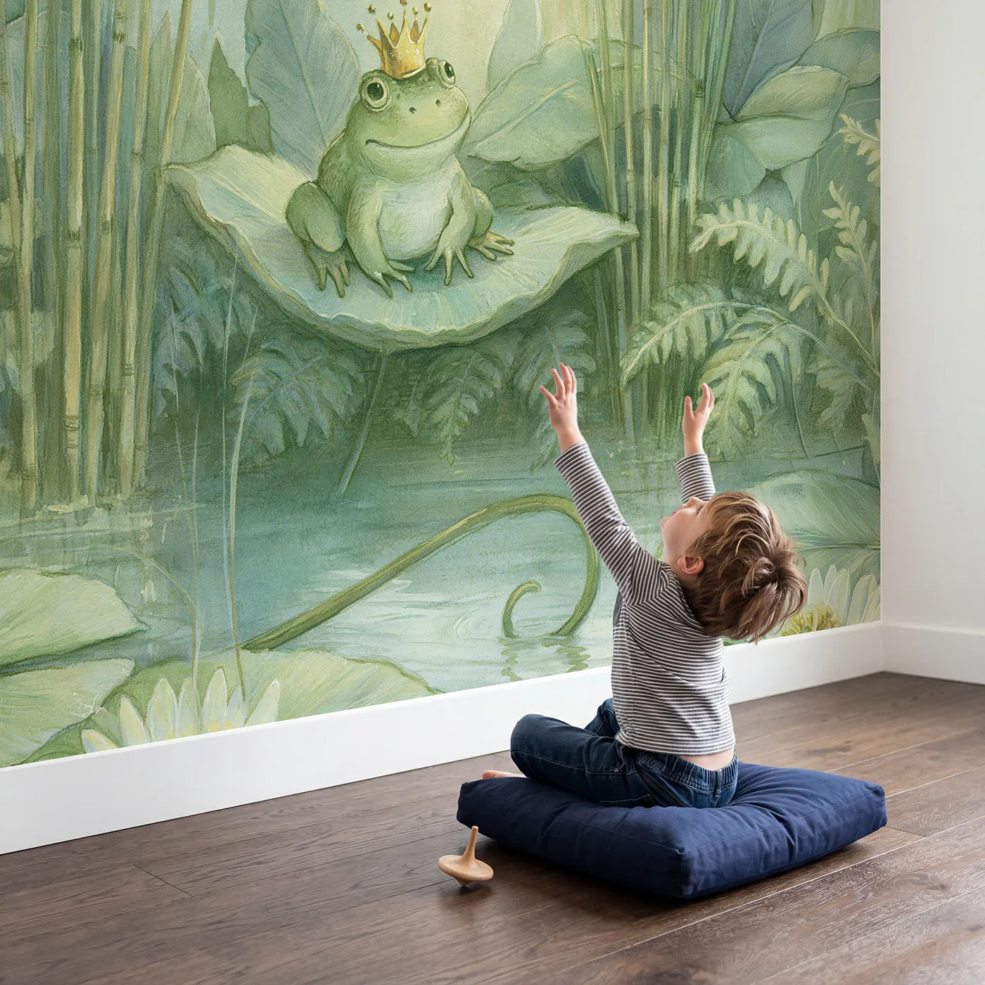 Child in nursery with Jungle Frog Prince Wallpaper Mural by Whimsy Tots