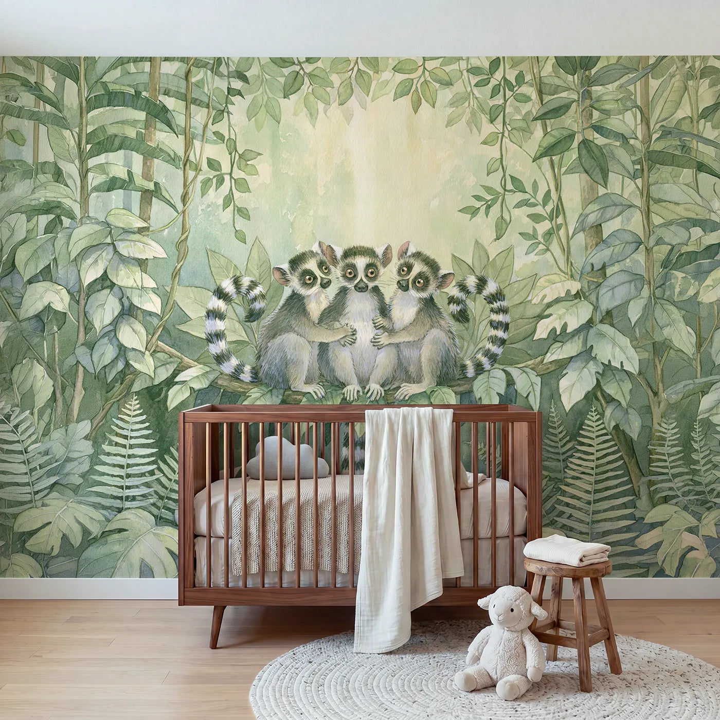 Storybook wall mural of three tumbling lemurs by Whimsy Tots