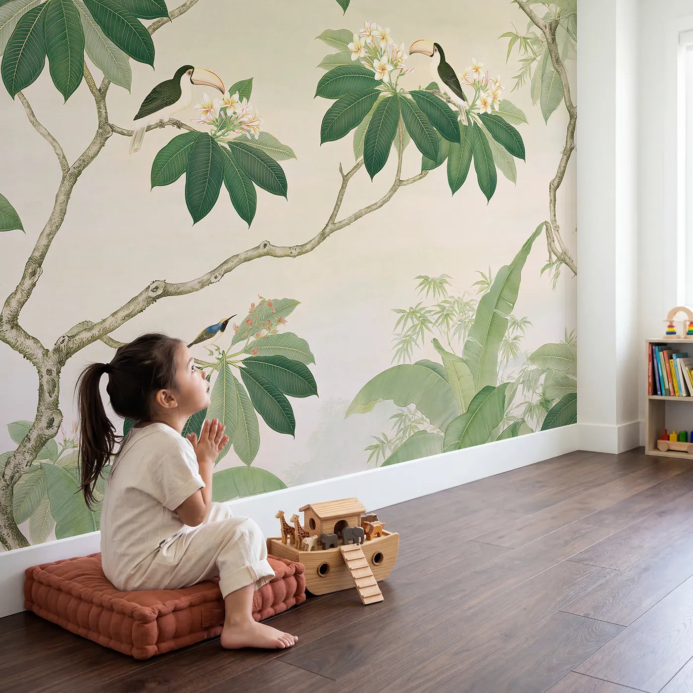 Child in nursery with The Flowering Jungle Canopy Wallpaper Mural by Whimsy Tots