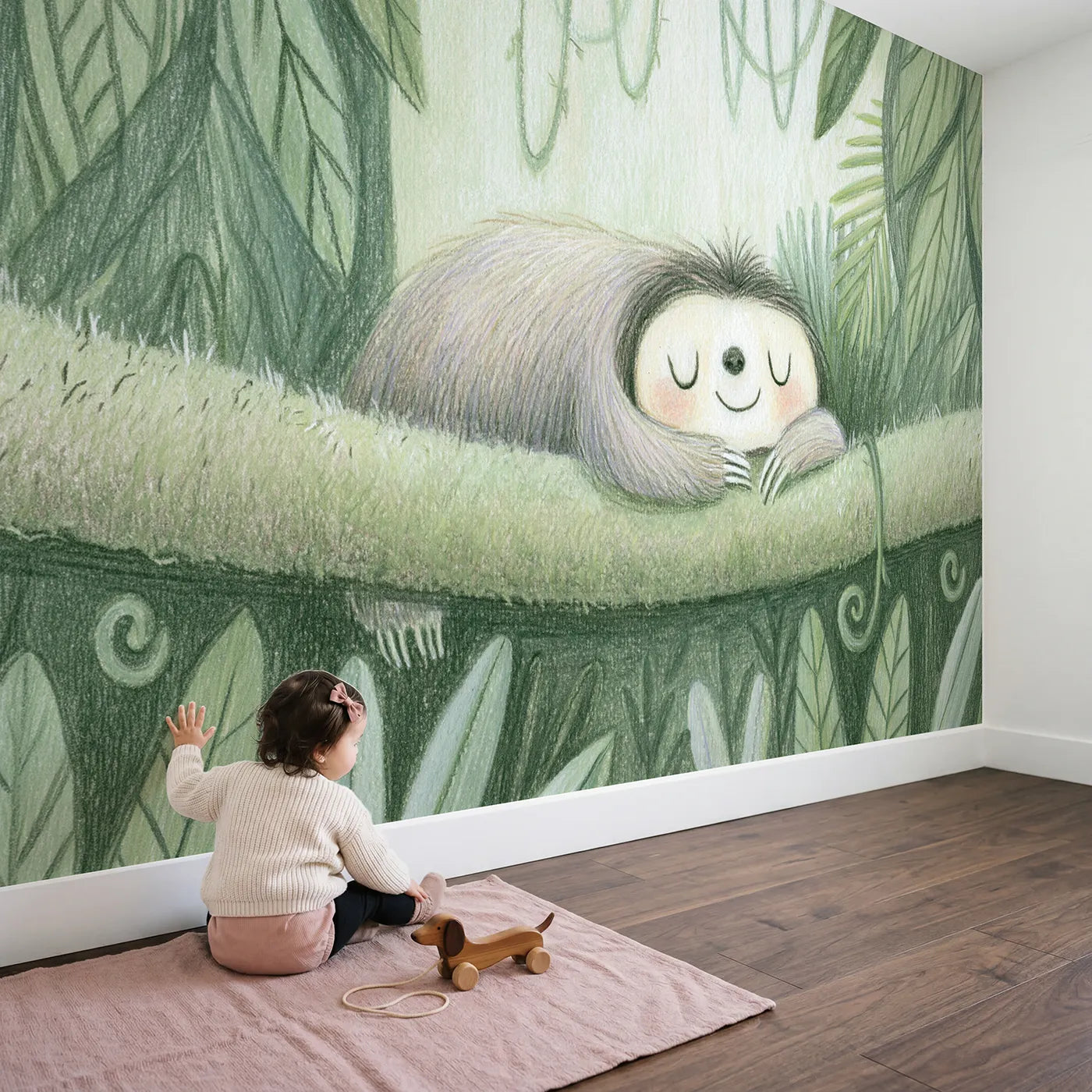Child in nursery with Baby Sloth Snuggle Wallpaper Mural by Whimsy Tots