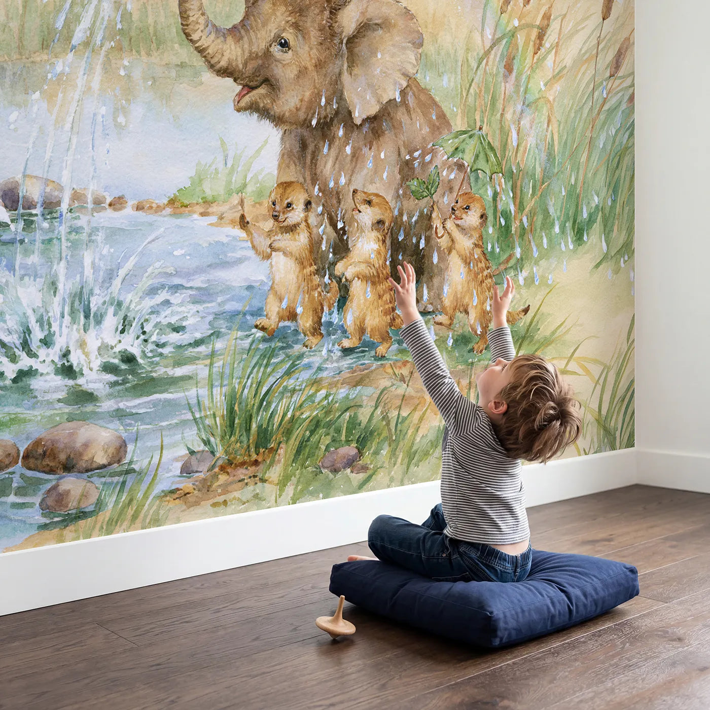 Child in nursery with Elephant Trunk Sprinkler Wallpaper Mural by Whimsy Tots