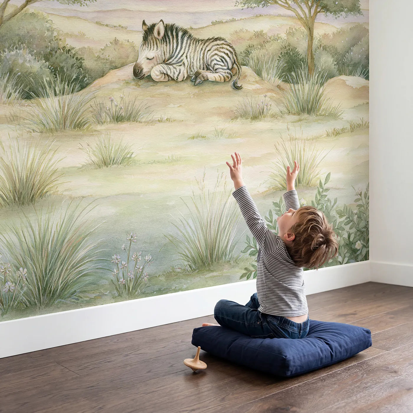 Child in nursery with Zebra Bedtime Toy Wallpaper Mural by Whimsy Tots