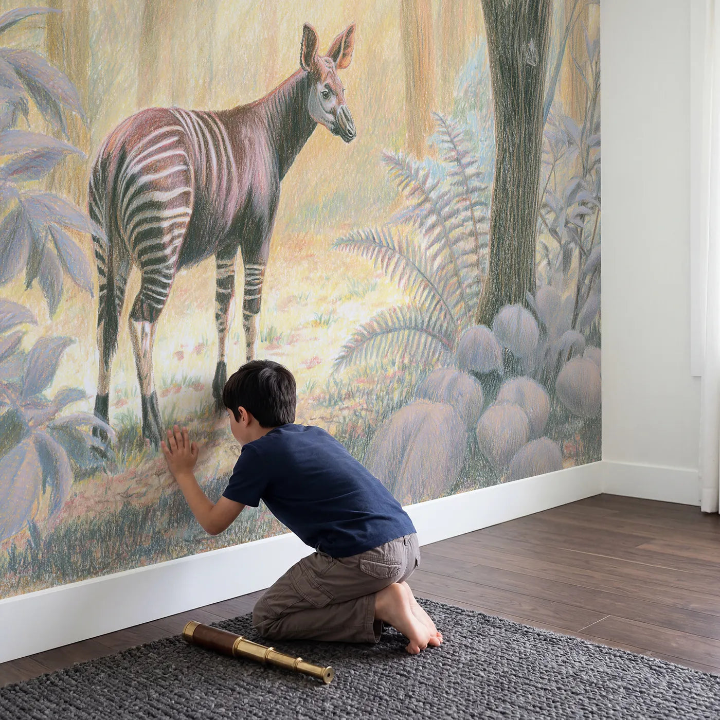 Child in nursery with Forest Okapi Wallpaper Mural by Whimsy Tots