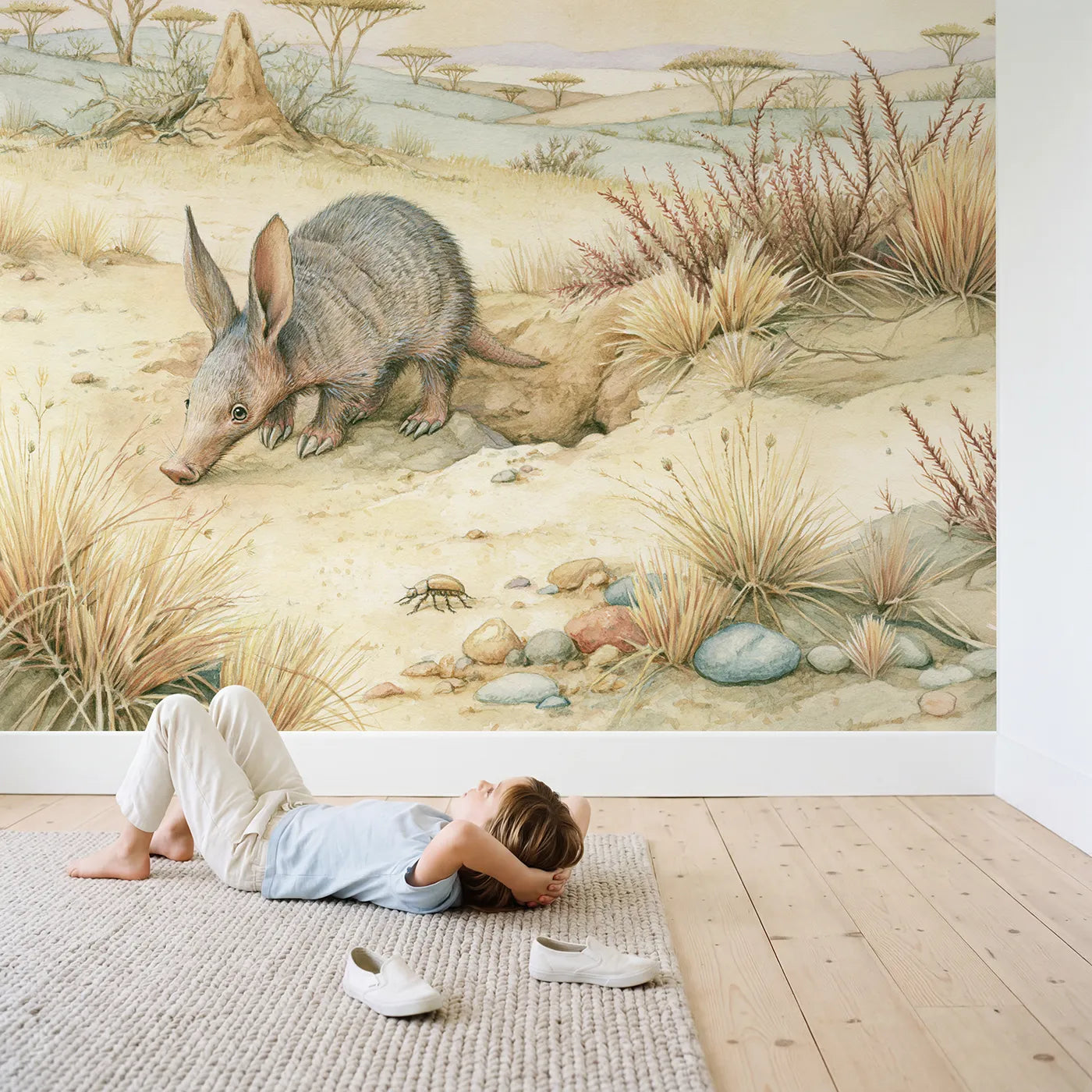 Child in nursery with Curious Aardvark Wallpaper Mural by Whimsy Tots