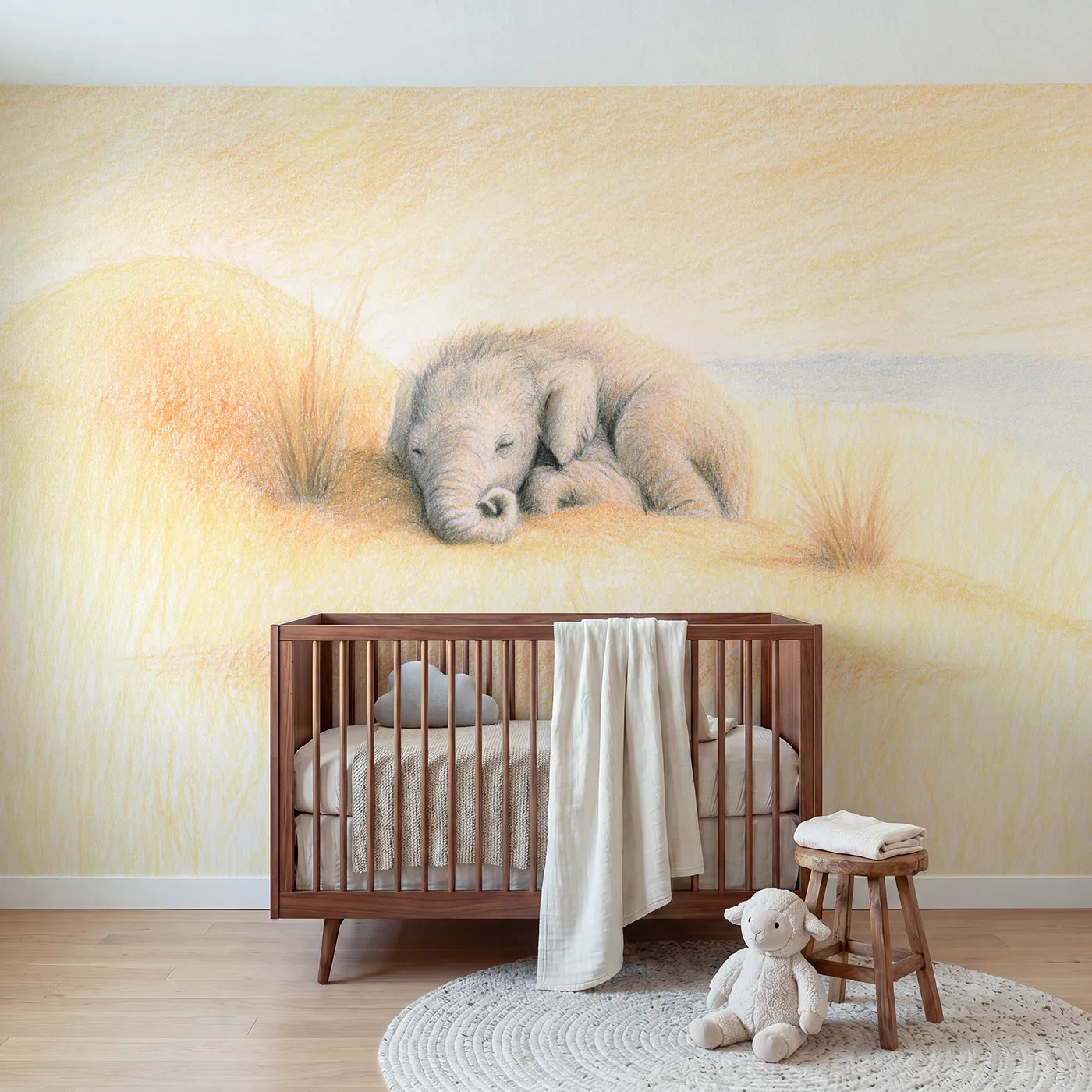 Colored-pencil wall mural of a sleepy baby elephant by Whimsy Tots