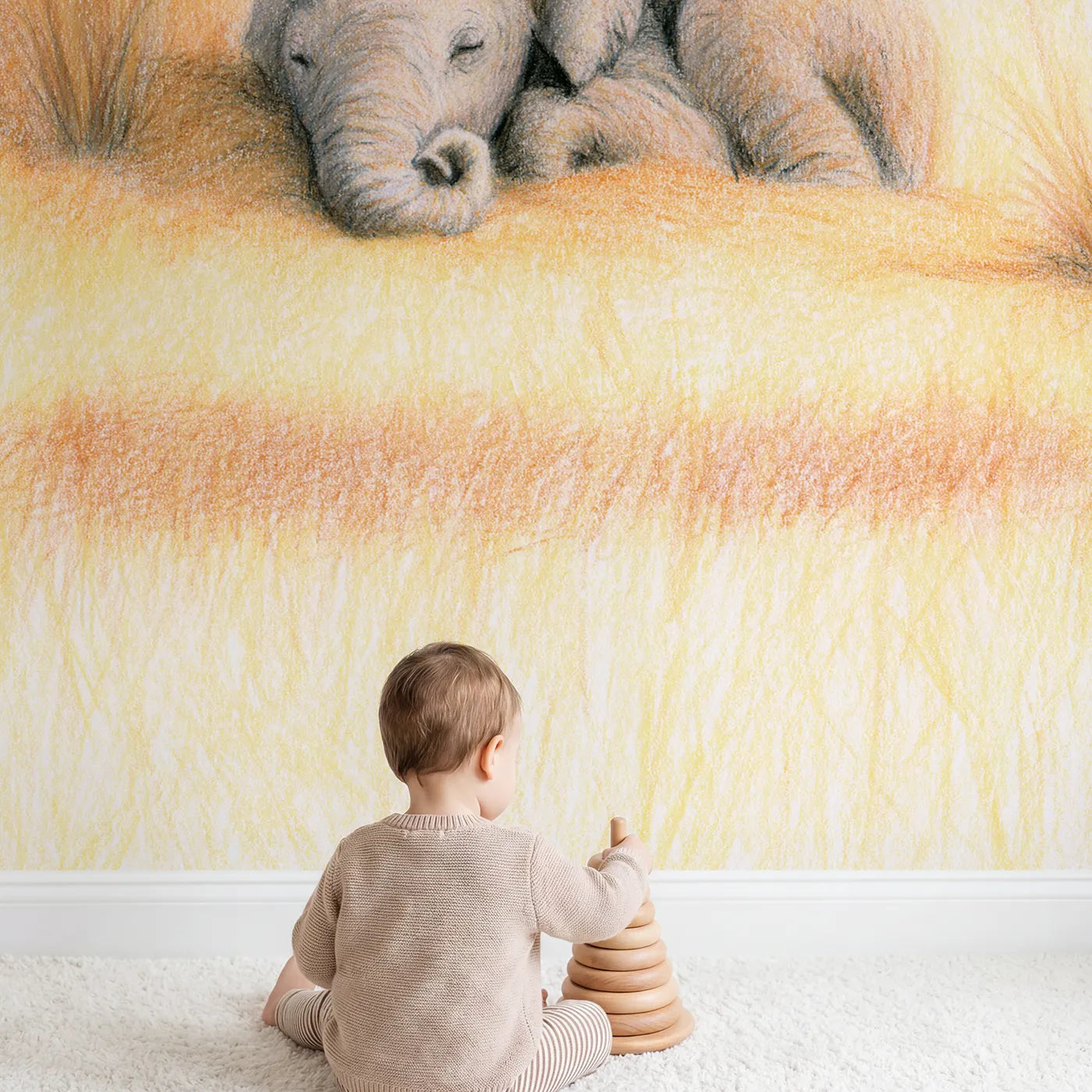 Child in nursery with Sleepy Baby Elephant Wallpaper Mural by Whimsy Tots