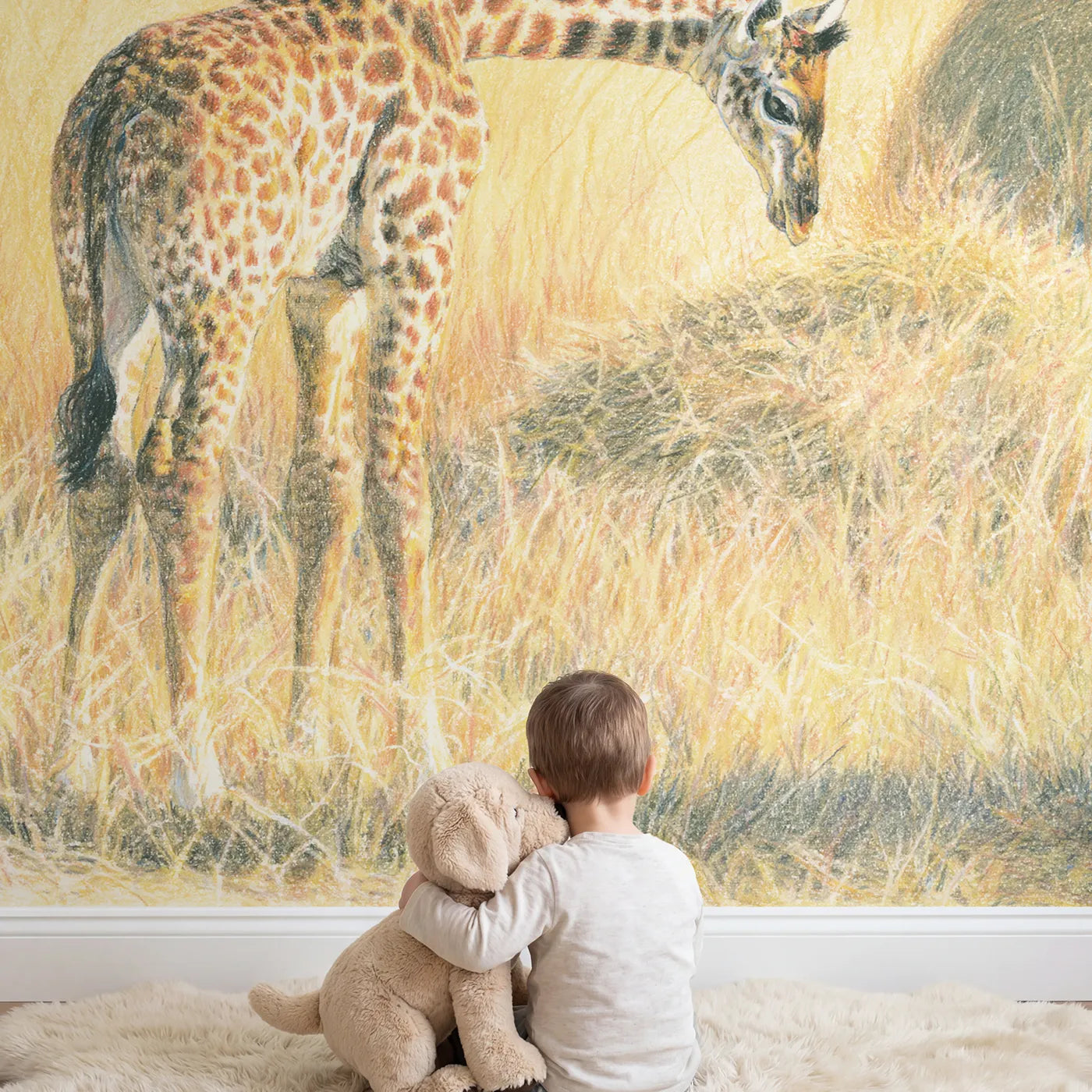 Child in nursery with Little Giraffe Calf Wallpaper Mural by Whimsy Tots