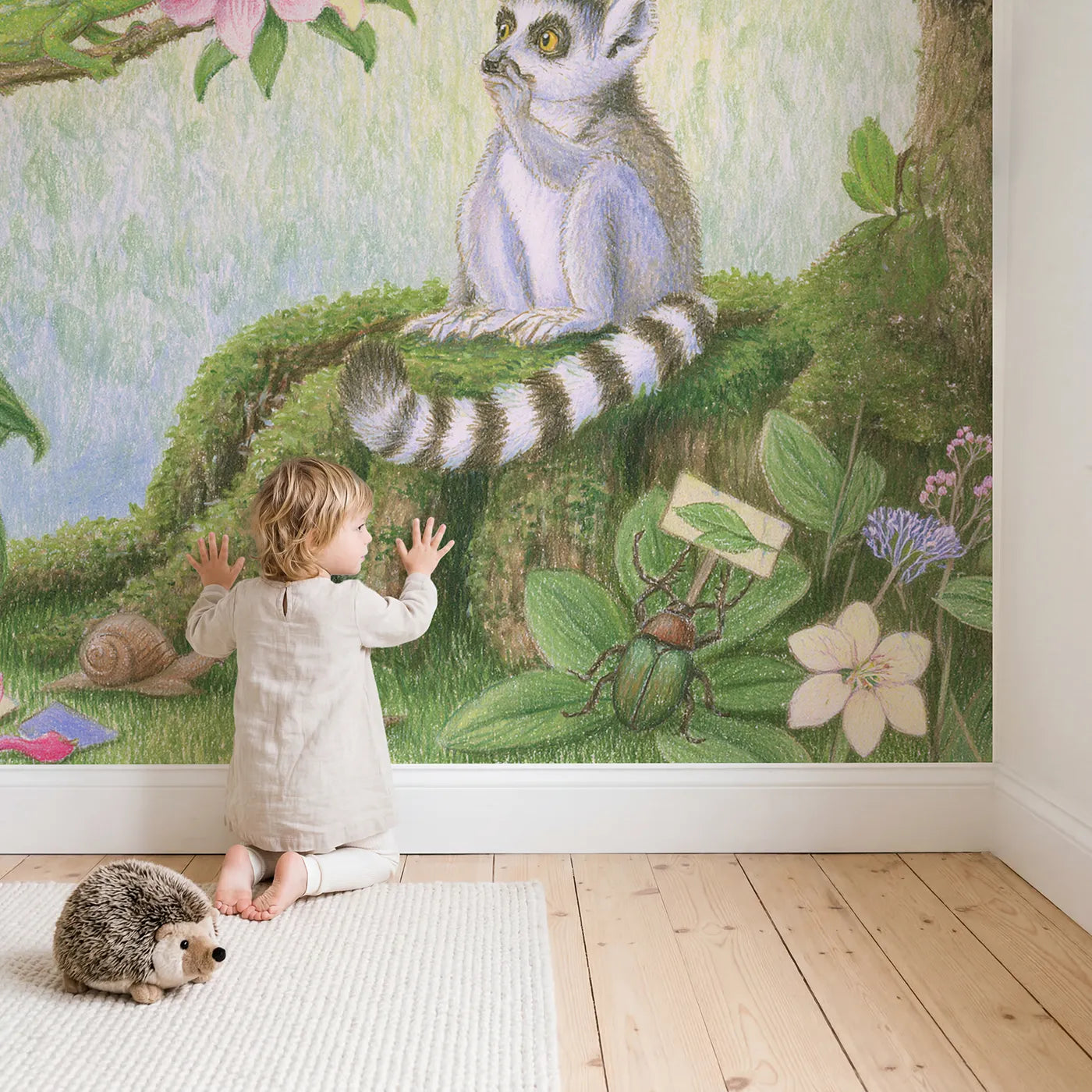 Child in nursery with Chameleon Color Match Wallpaper Mural by Whimsy Tots